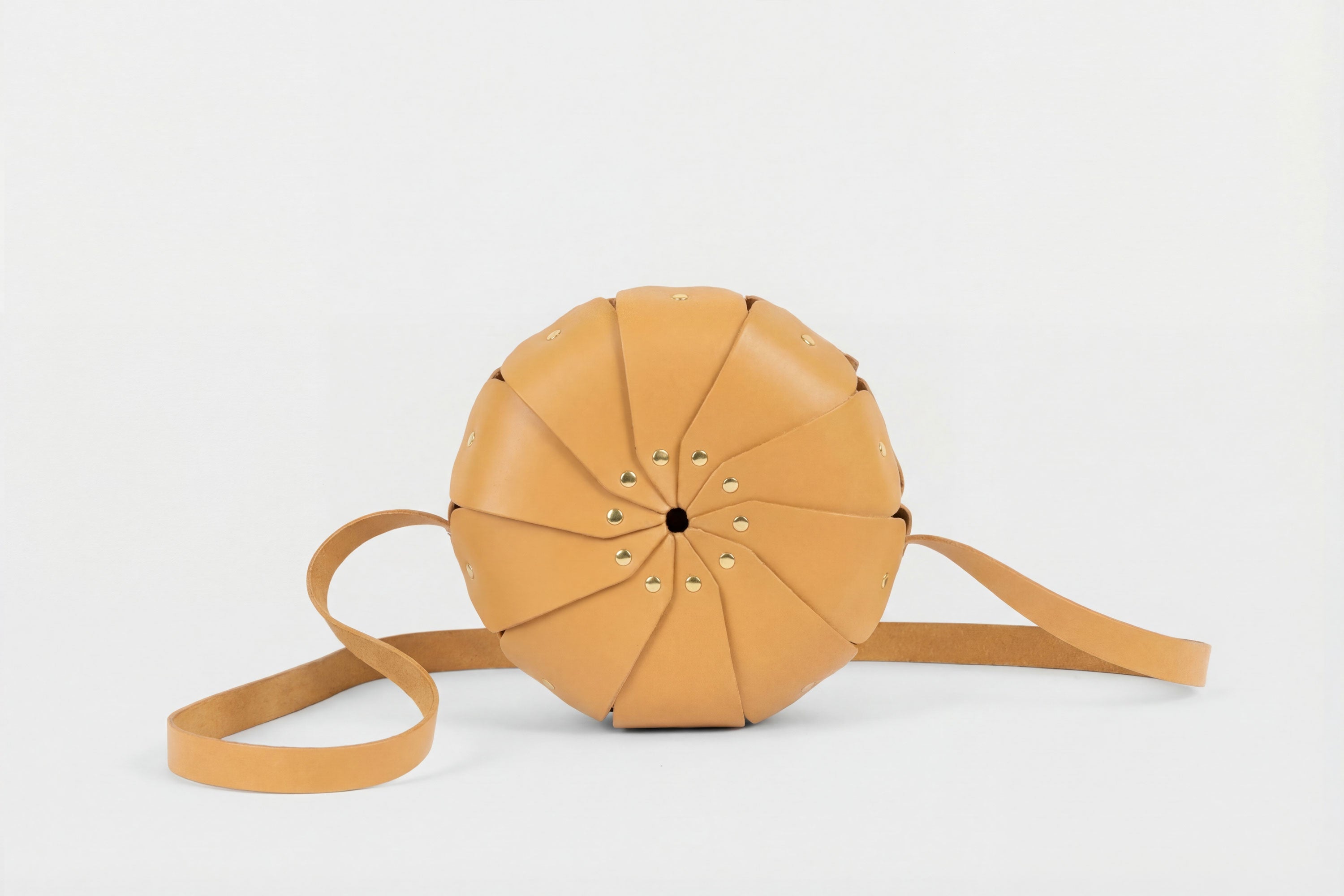 Anemo Leather Bag Brown Color Floral Design Premium Minimalist Modern Circle Round Pouch Crossbody Atelier Madre Manuel Dreesmann Barcelona Spain