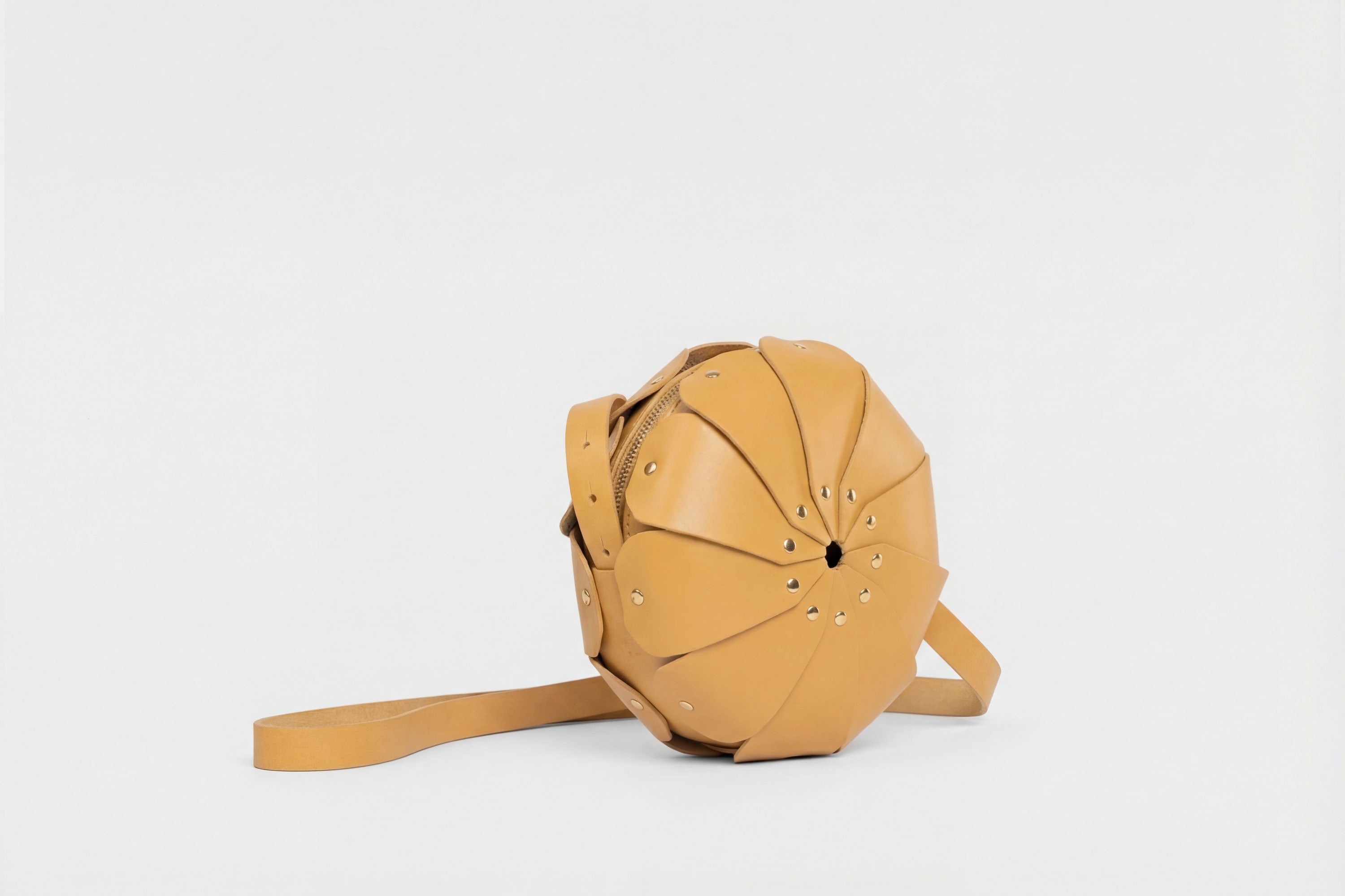 Anemo Leather Bag Brown Color Floral Design Premium Minimalist Modern Circle Round Pouch Crossbody Atelier Madre Manuel Dreesmann Barcelona Spain