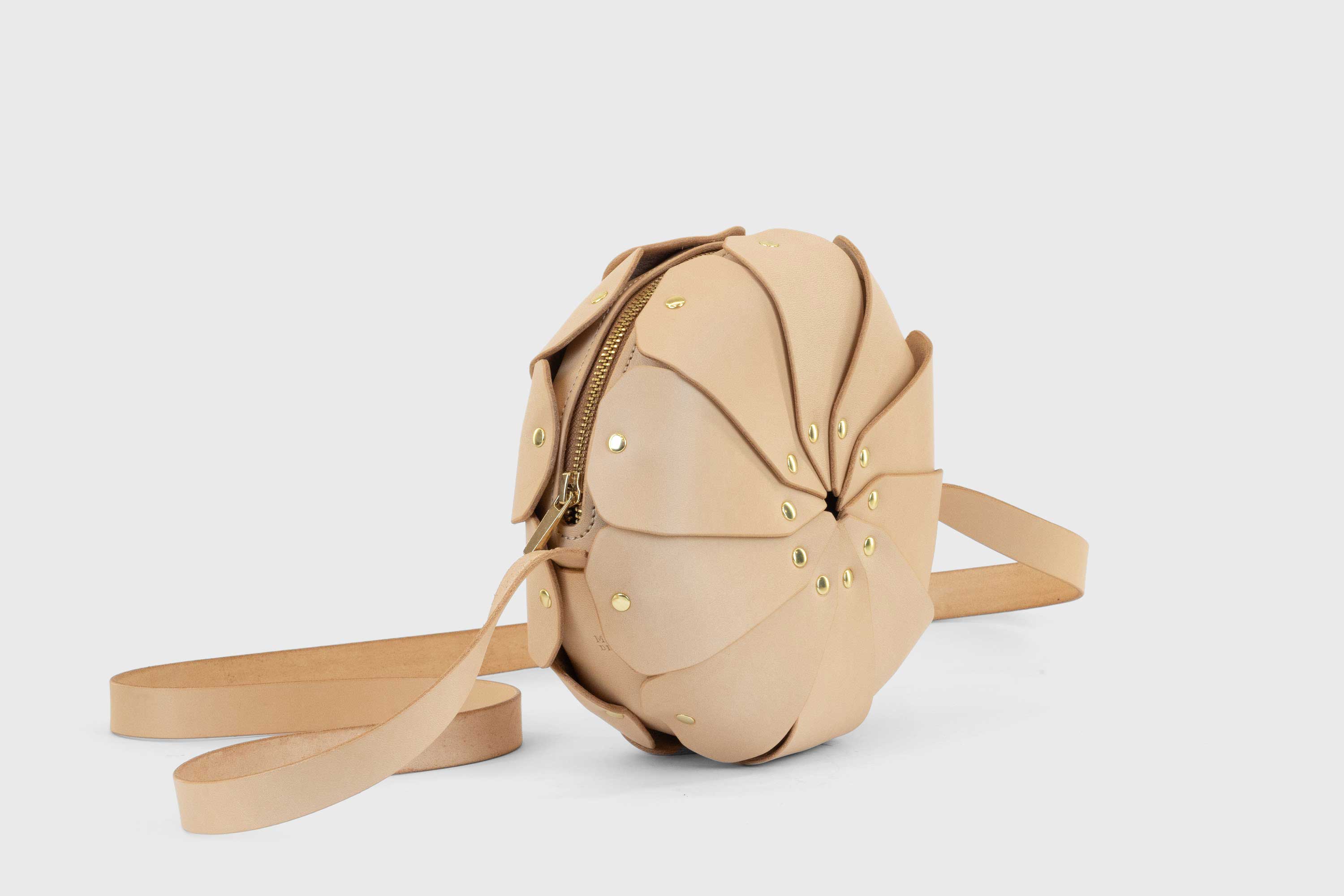 Anemo Leather Bag Front Natural Color Floral Design Premium Minimalist Modern Circle Round Pouch Crossbody Atelier Madre Manuel Dreesmann Barcelona