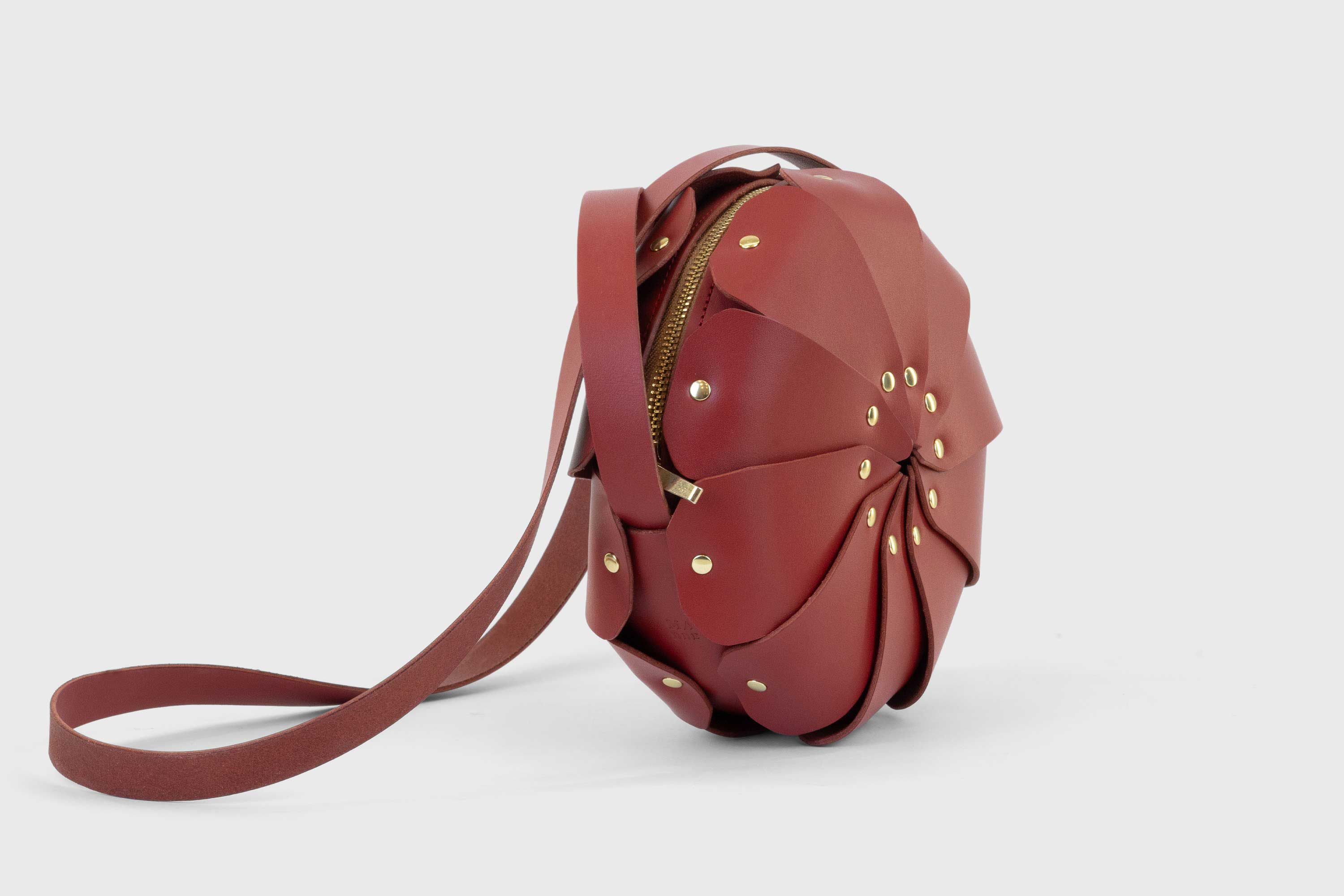 Anemo Leather Bag Front Red Color Floral Design Premium Minimalist Modern Circle Round Pouch Crossbody Atelier Madre Manuel Dreesmann Barcelona