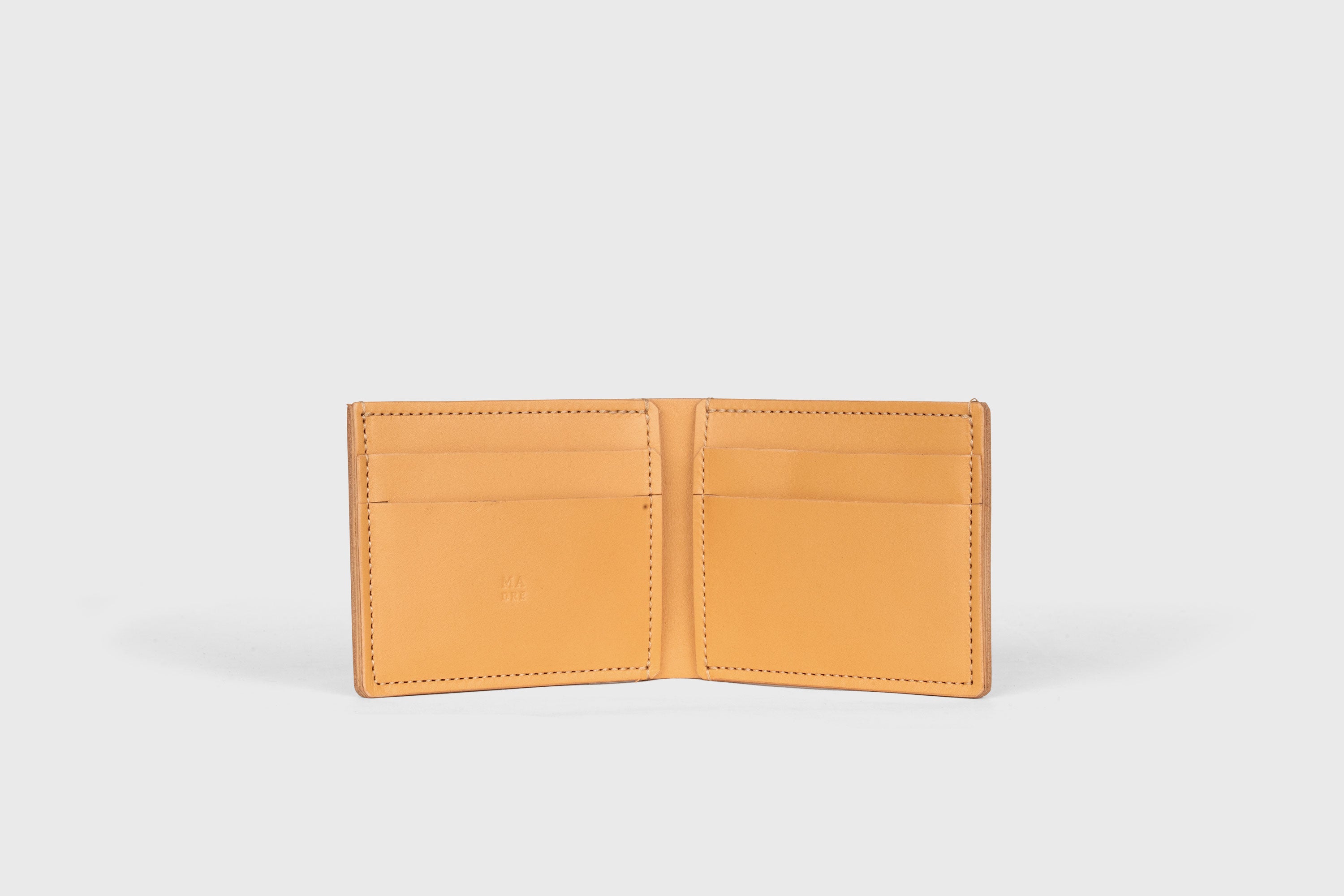 Bifold Wallet Horizontal With 6 Card Slots In Brown Color In Vegetable Tanned Leather Minimalistic Design Atelier Madre Manuel Dreesmann Barcelona Spain