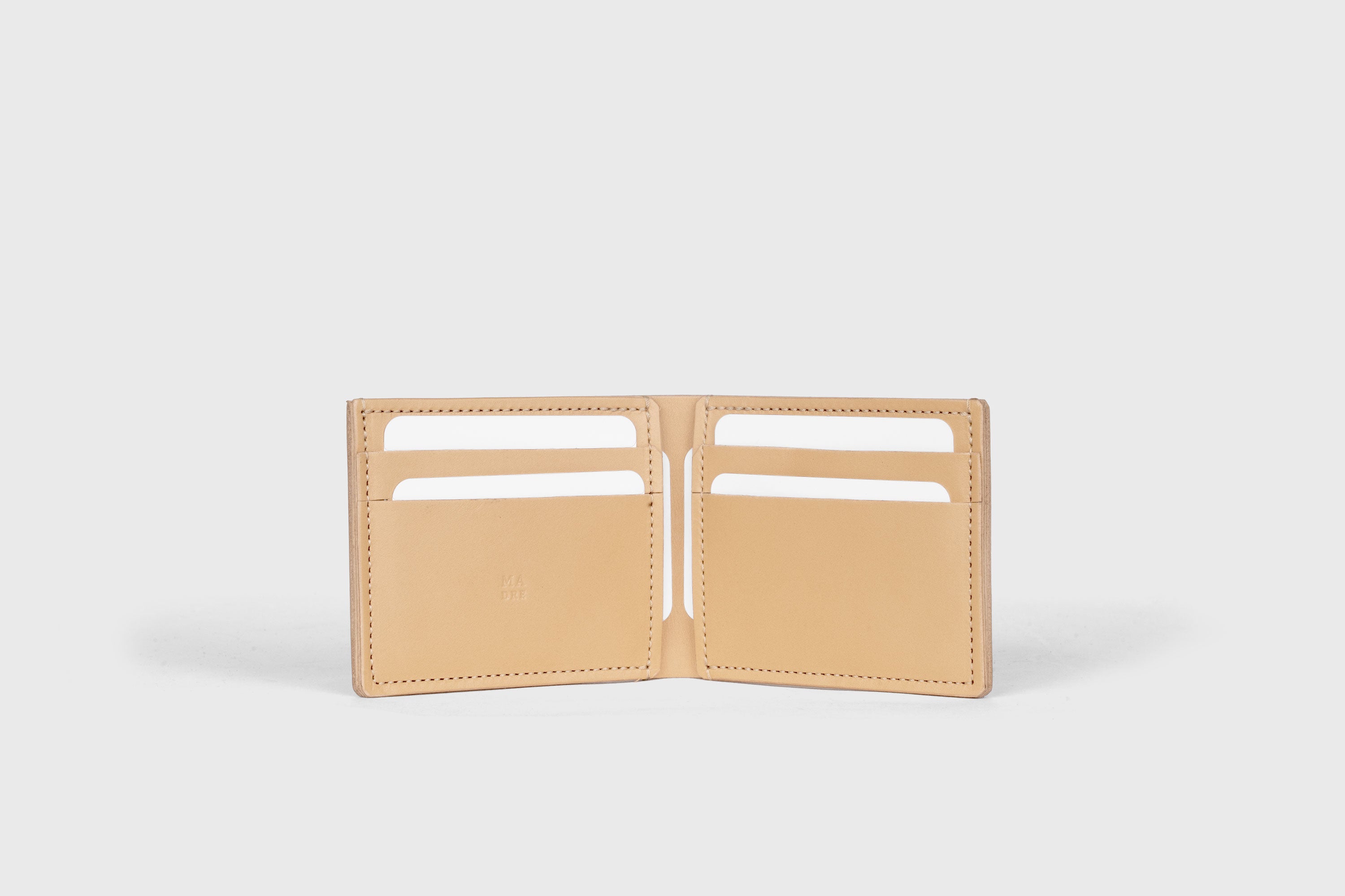 Bifold Wallet Horizontal With 6 Card Slots In Natural Color In Vegetable Tanned Leather Minimalistic Design Atelier Madre Manuel Dreesmann Barcelona Spain