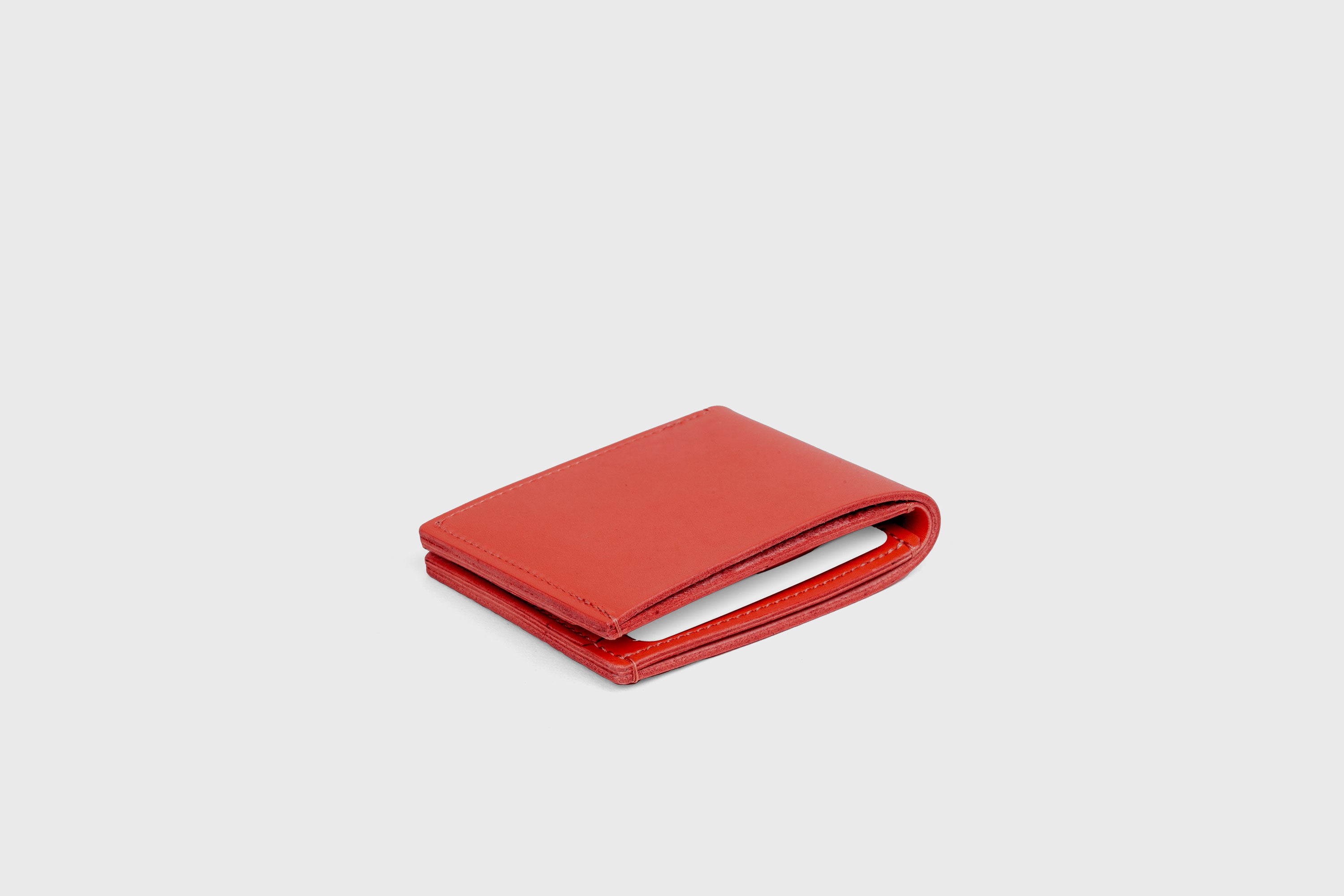 Bifold Wallet Horizontal With 6 Card Slots In Red Color In Vegetable Tanned Leather Minimalistic Design Atelier Madre Manuel Dreesmann Barcelona Spain