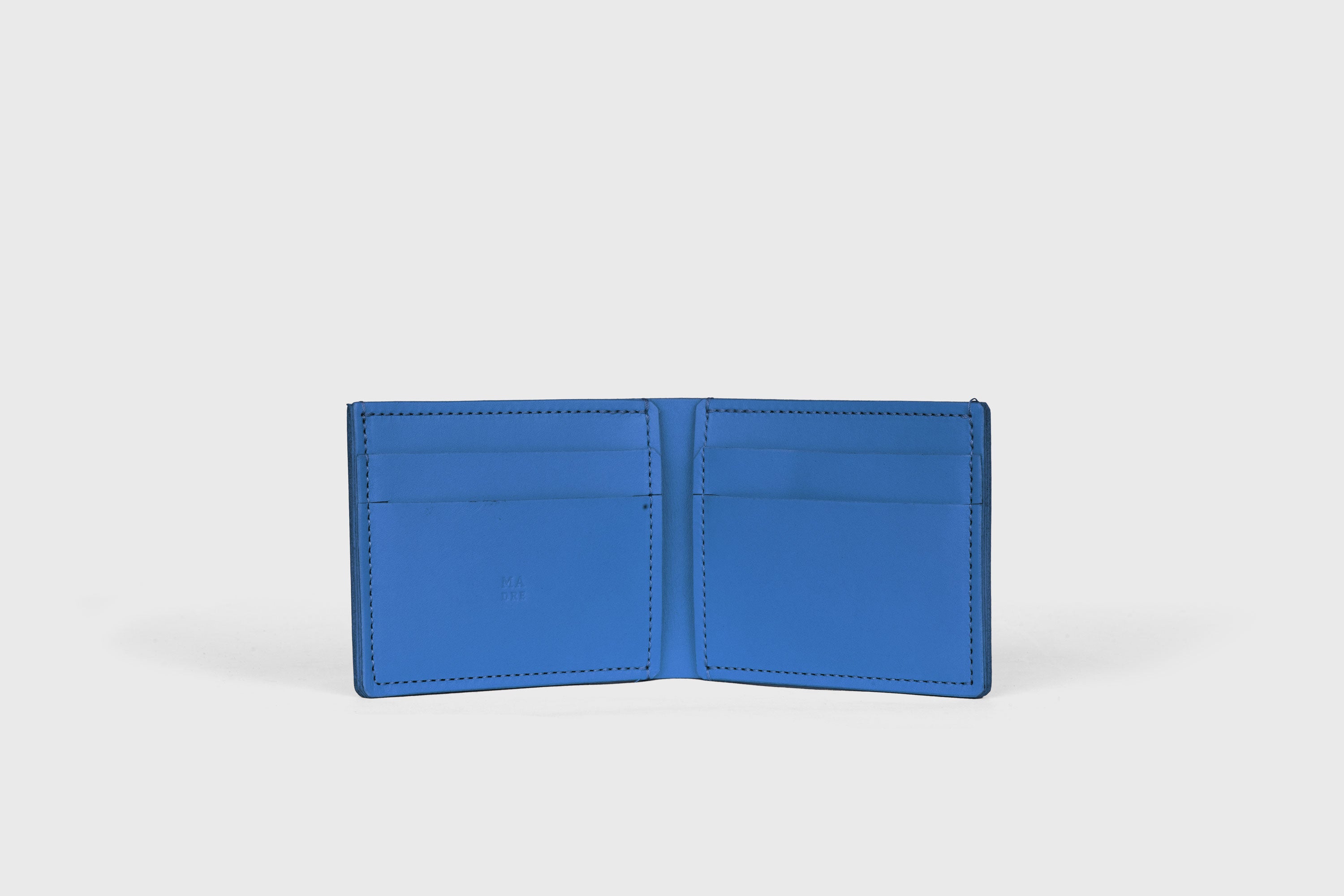 Bifold Wallet Horizontal With 6 Card Slots In Royal Blue Color In Vegetable Tanned Leather Minimalistic Design Atelier Madre Manuel Dreesmann Barcelona Spain