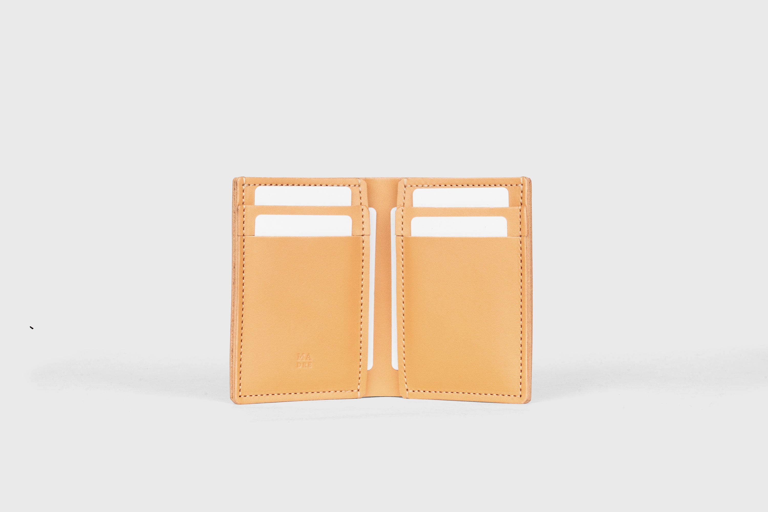 Bifold Wallet Vertical 6 Slots In Brown Color In Vegetable Tanned Leather Minimalistic Design Atelier Madre Manuel Dreesmann Barcelona Spain