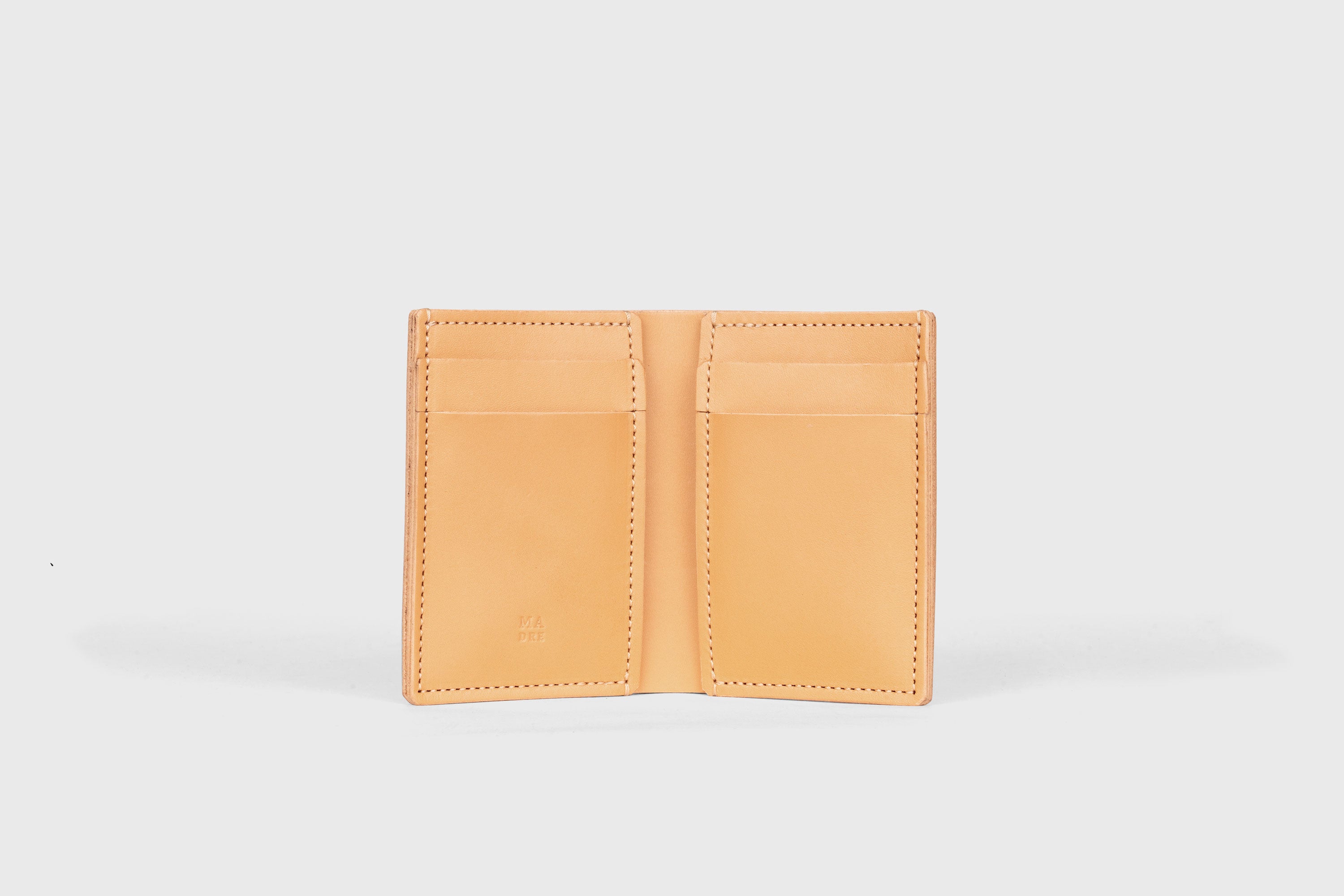 Bifold Wallet Vertical 6 Slots In Brown Color In Vegetable Tanned Leather Minimalistic Design Atelier Madre Manuel Dreesmann Barcelona Spain
