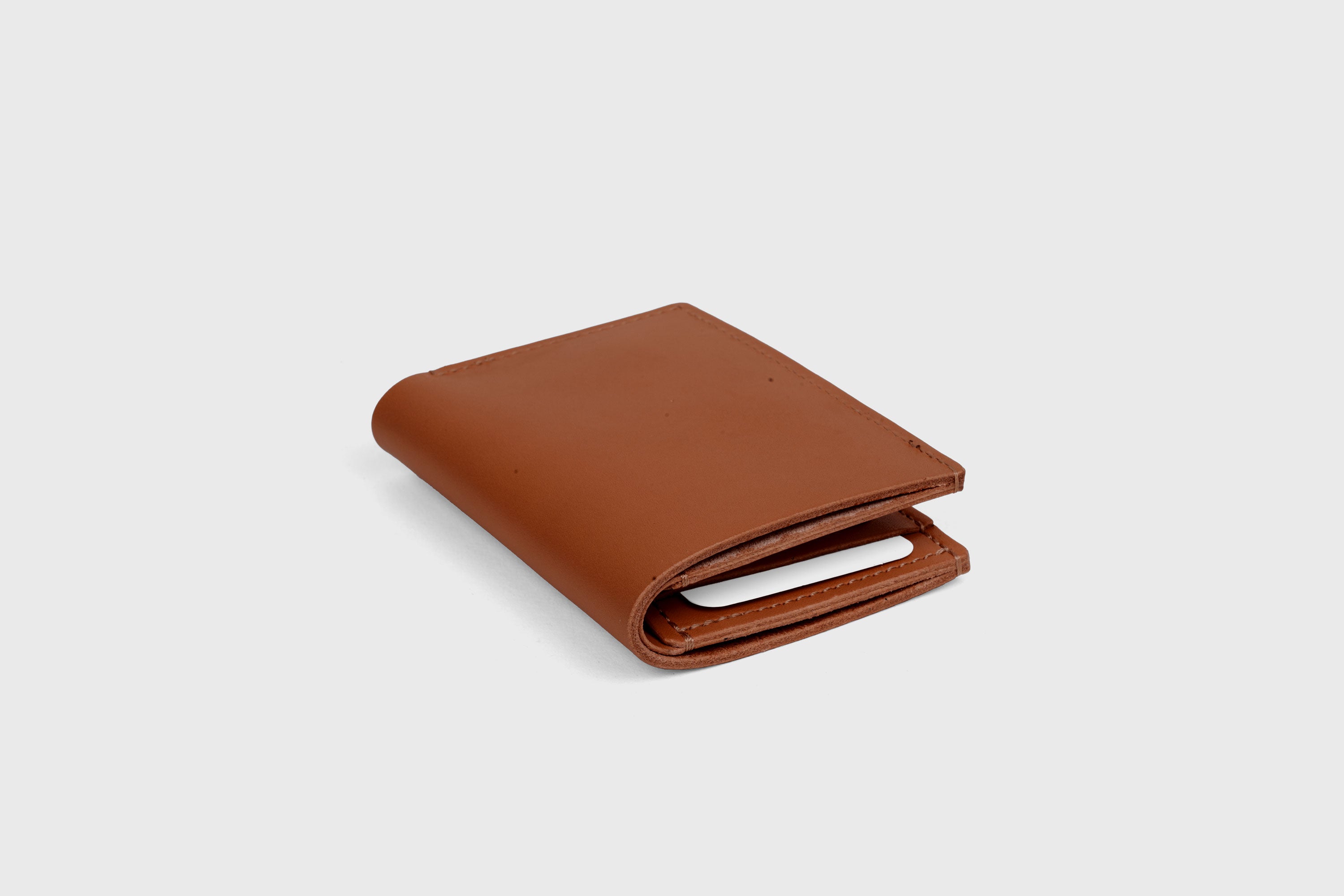 Bifold Wallet Vertical 6 Slots In Dark Brown Color In Vegetable Tanned Leather Minimalistic Design Atelier Madre Manuel Dreesmann Barcelona Spain