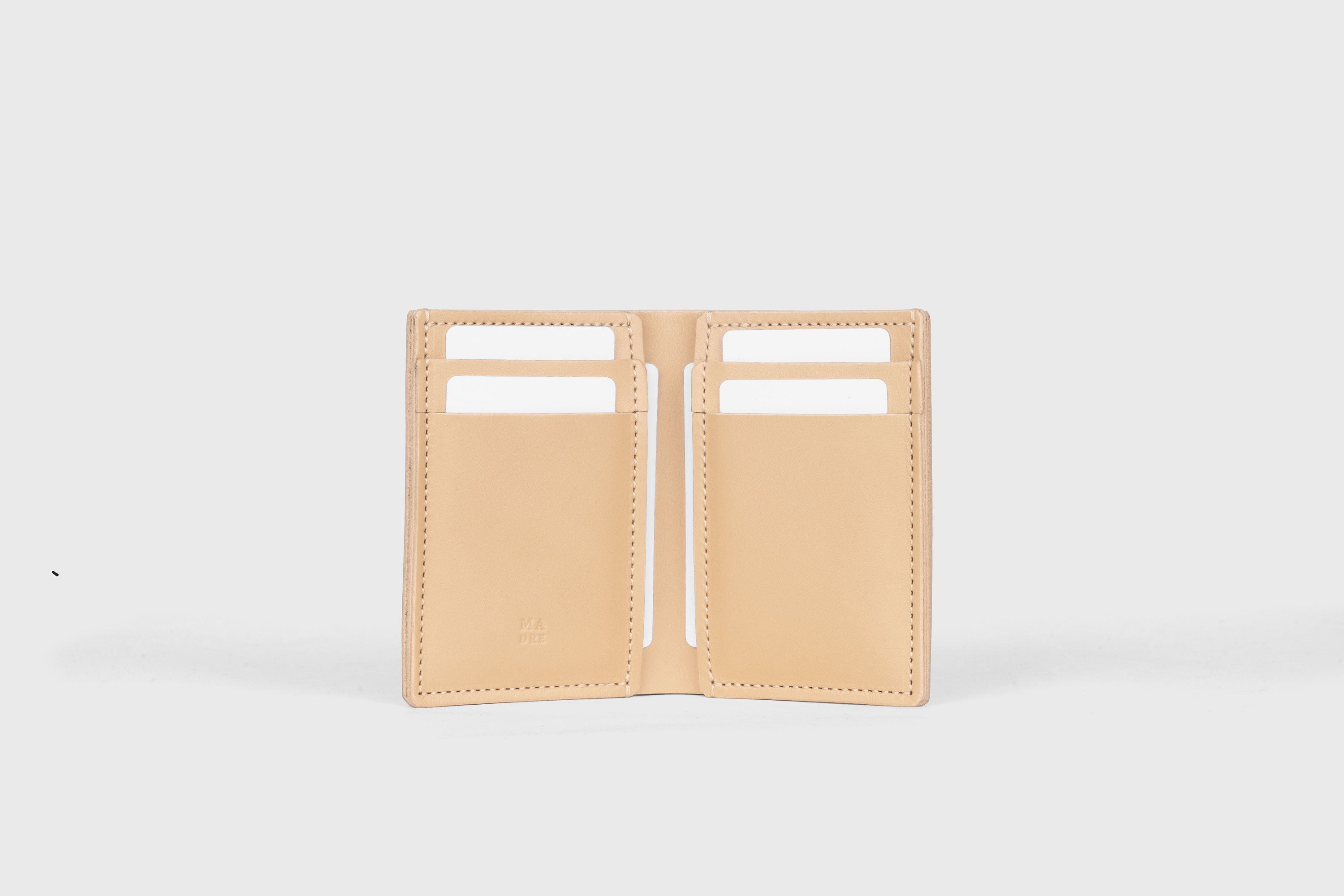 Bifold Wallet Vertical 6 Slots In Natural Color In Vegetable Tanned Leather Minimalistic Design Atelier Madre Manuel Dreesmann Barcelona Spain