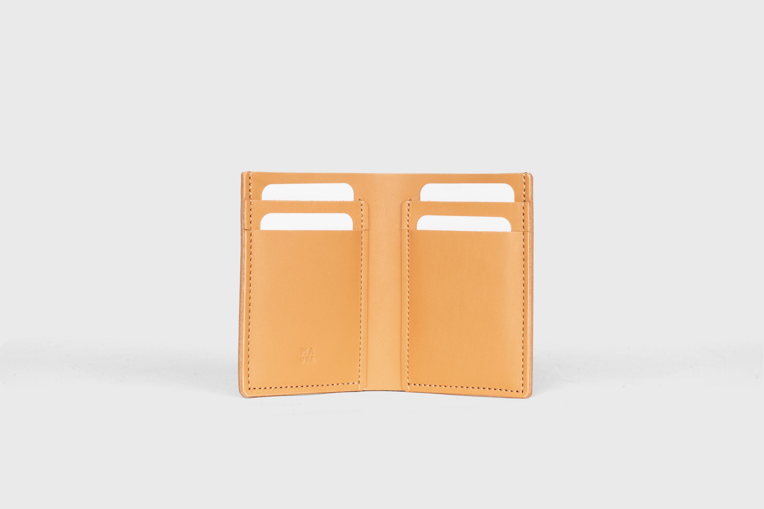 Bifold Wallet Vertical In Brown Color In Vegetable Tanned Leather Minimalistic Slim Design Atelier Madre Manuel Dreesmann Barcelona Spain