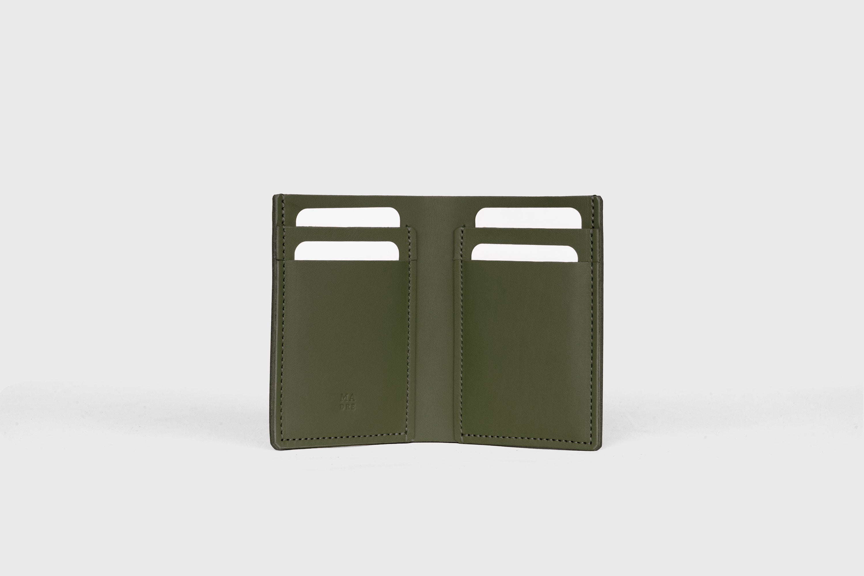 Bifold Wallet Vertical In Olive Green Color In Vegetable Tanned Leather Minimalistic Slim Design Atelier Madre Manuel Dreesmann Barcelona Spain
