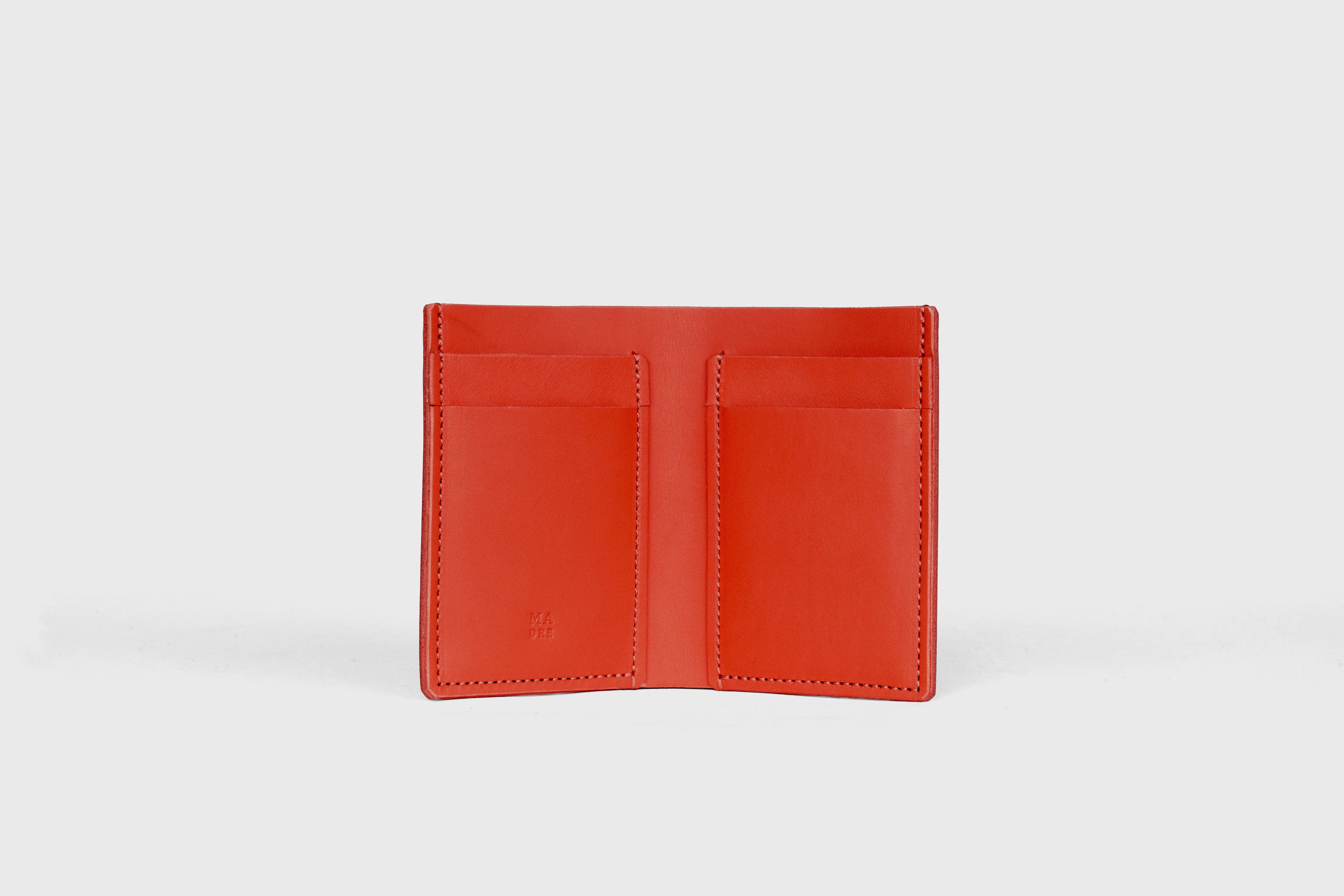 Bifold Wallet Vertical In Red Color In Vegetable Tanned Leather Minimalistic Slim Design Atelier Madre Manuel Dreesmann Barcelona Spain