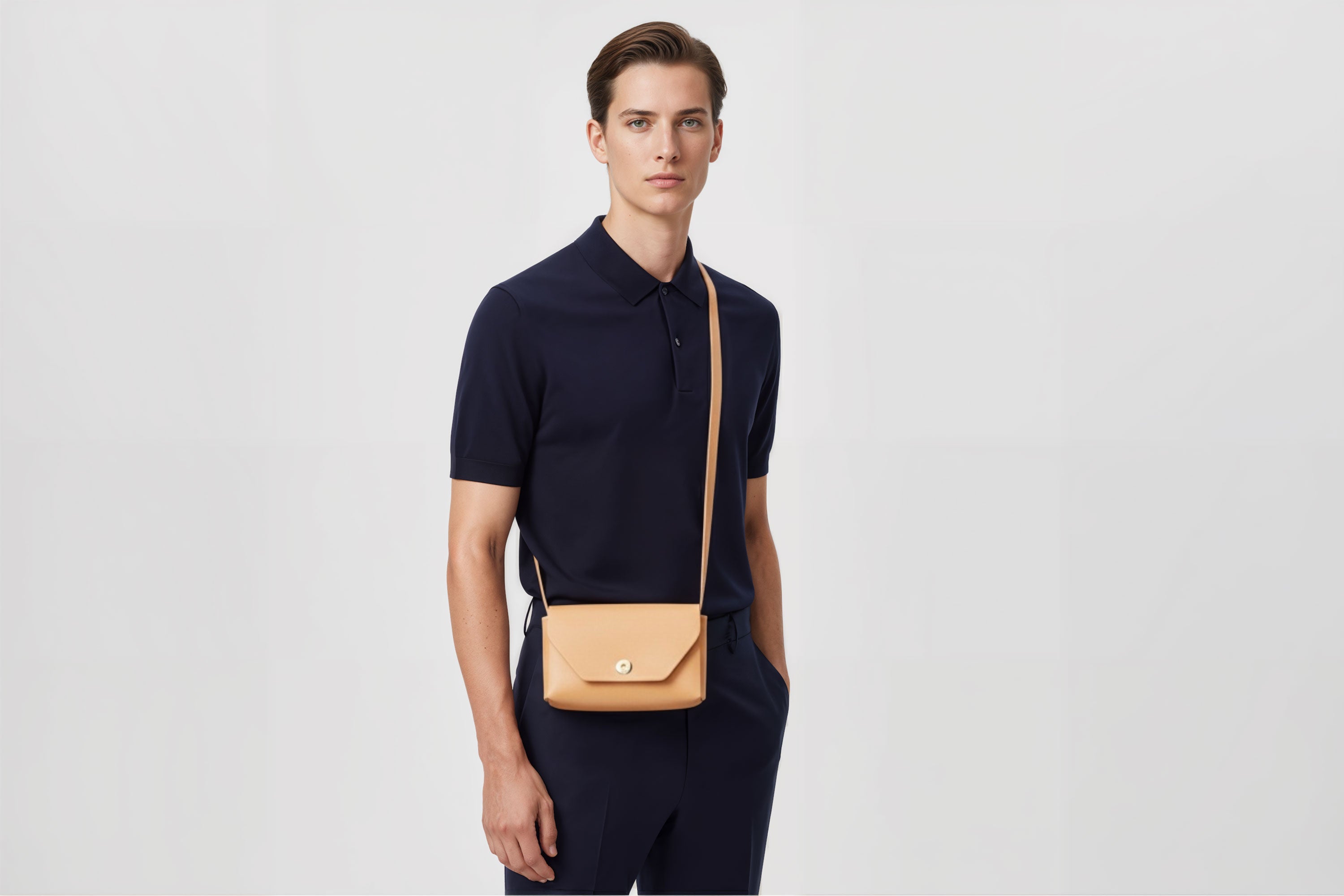 Brick Bag Natural Color Leather On Man Model Bright Background Vegetable Tanned Leather Modern Minimalist Design Premium Quality Atelier Madre Manuel Dreesmann Barcelona Spain