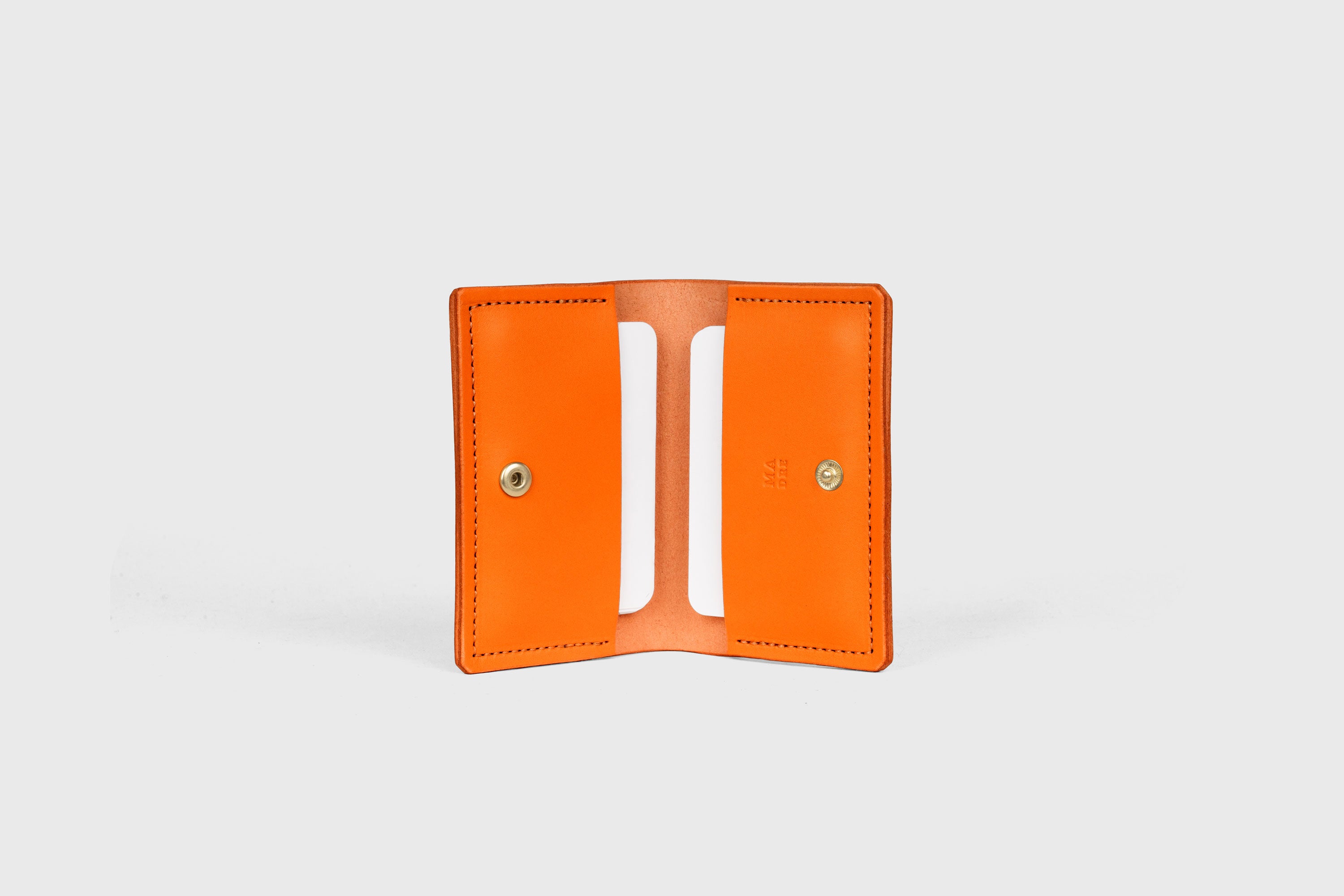 Card Etui In Orange Color In Vegetable Tanned Leather Minimalistic Design With Snap Buttons Atelier Madre Manuel Dreesmann Barcelona Spain