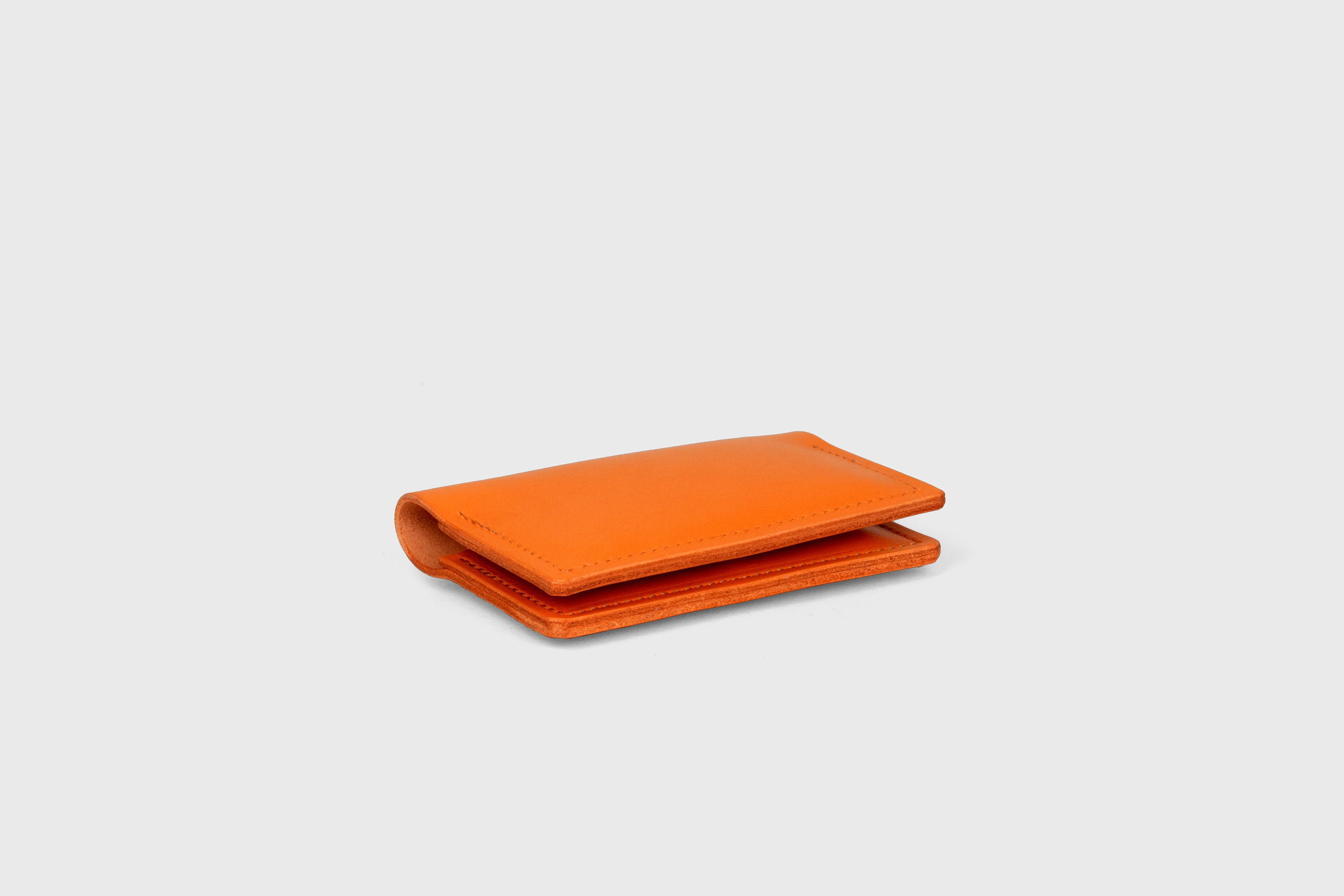 Card Etui In Orange Color In Vegetable Tanned Leather Minimalistic Design With Snap Buttons Atelier Madre Manuel Dreesmann Barcelona Spain