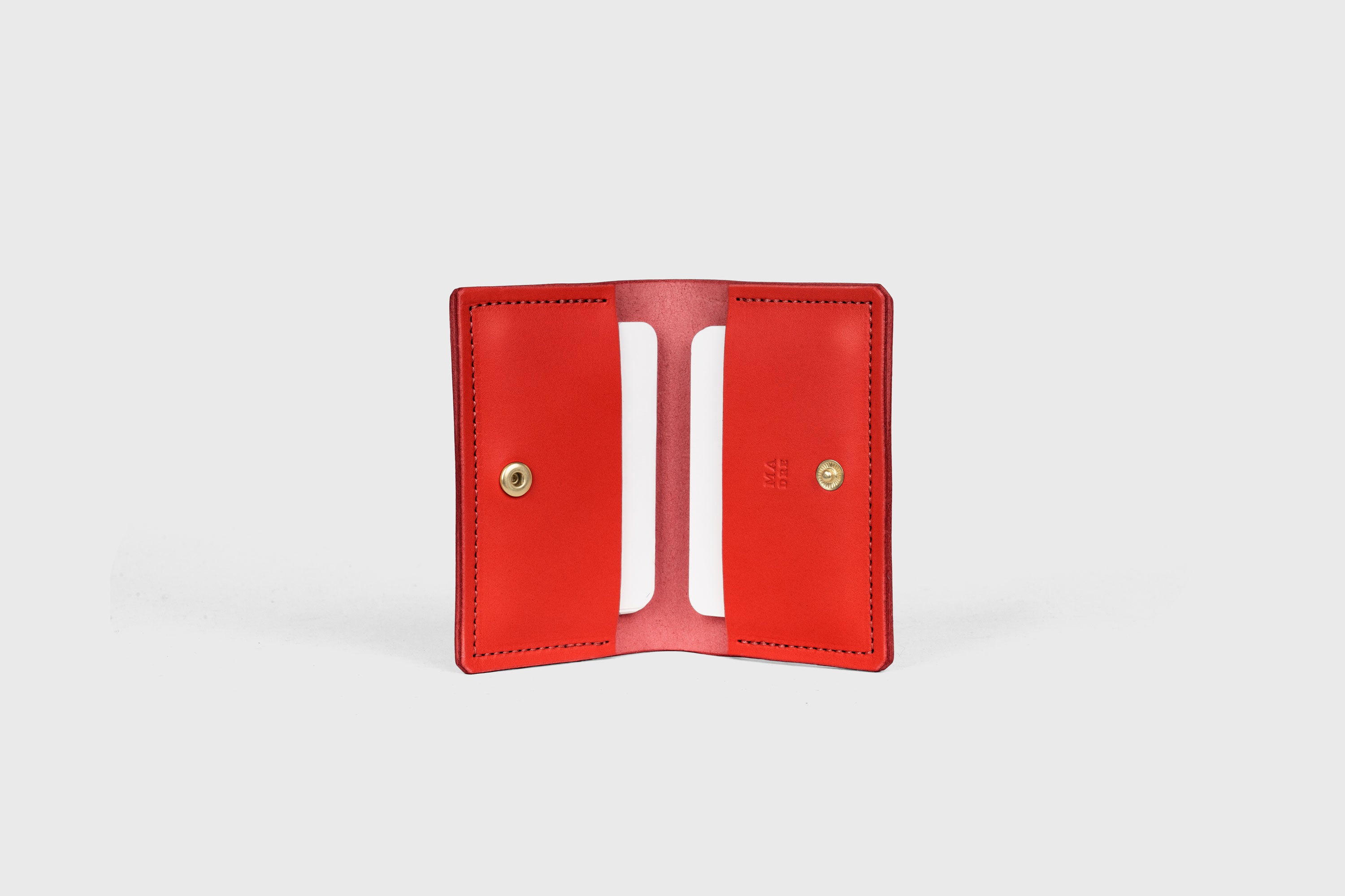 Card Etui In Red Color In Vegetable Tanned Leather Minimalistic Design With Snap Buttons Atelier Madre Manuel Dreesmann Barcelona Spain