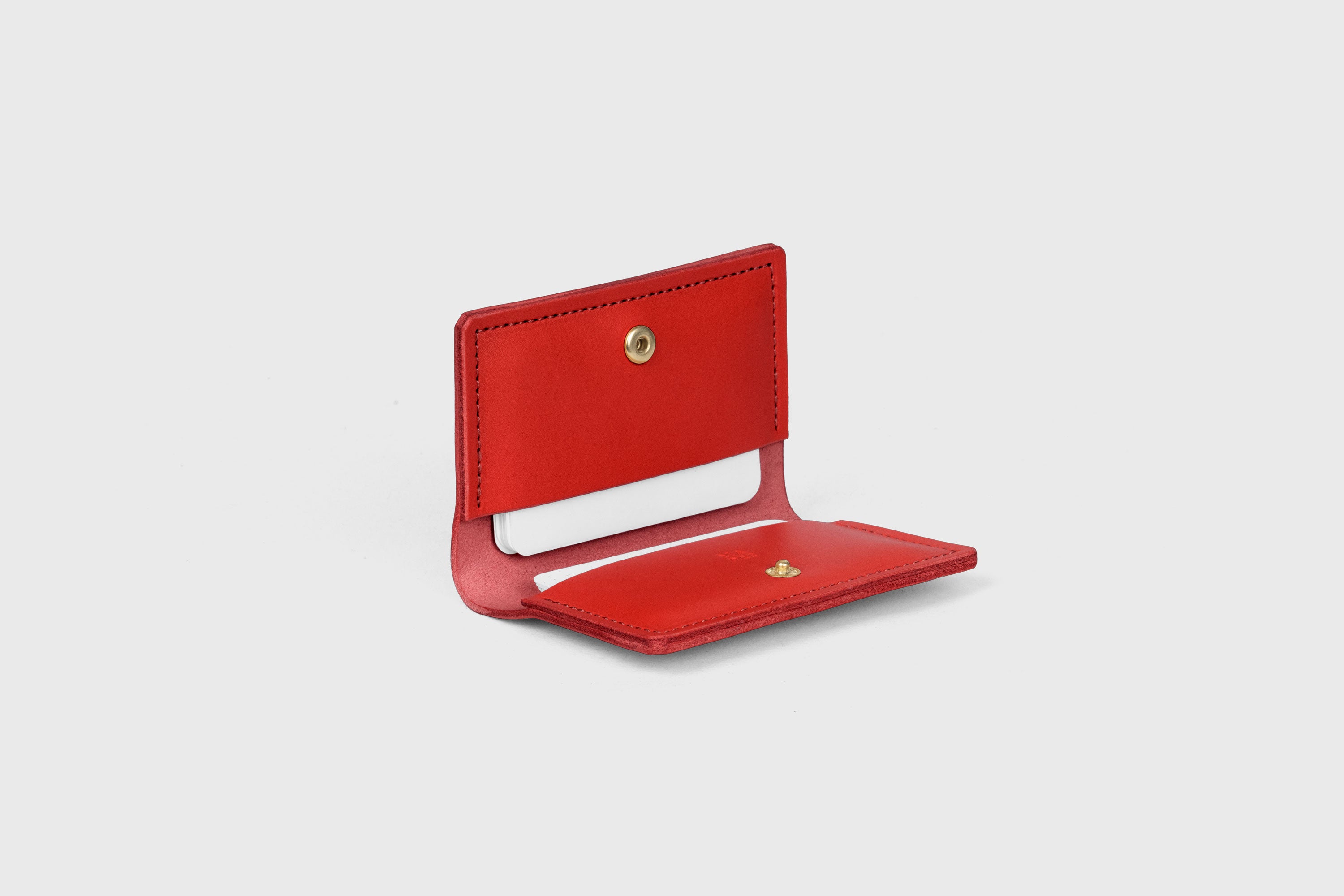 Card Etui In Red Color In Vegetable Tanned Leather Minimalistic Design With Snap Buttons Atelier Madre Manuel Dreesmann Barcelona Spain