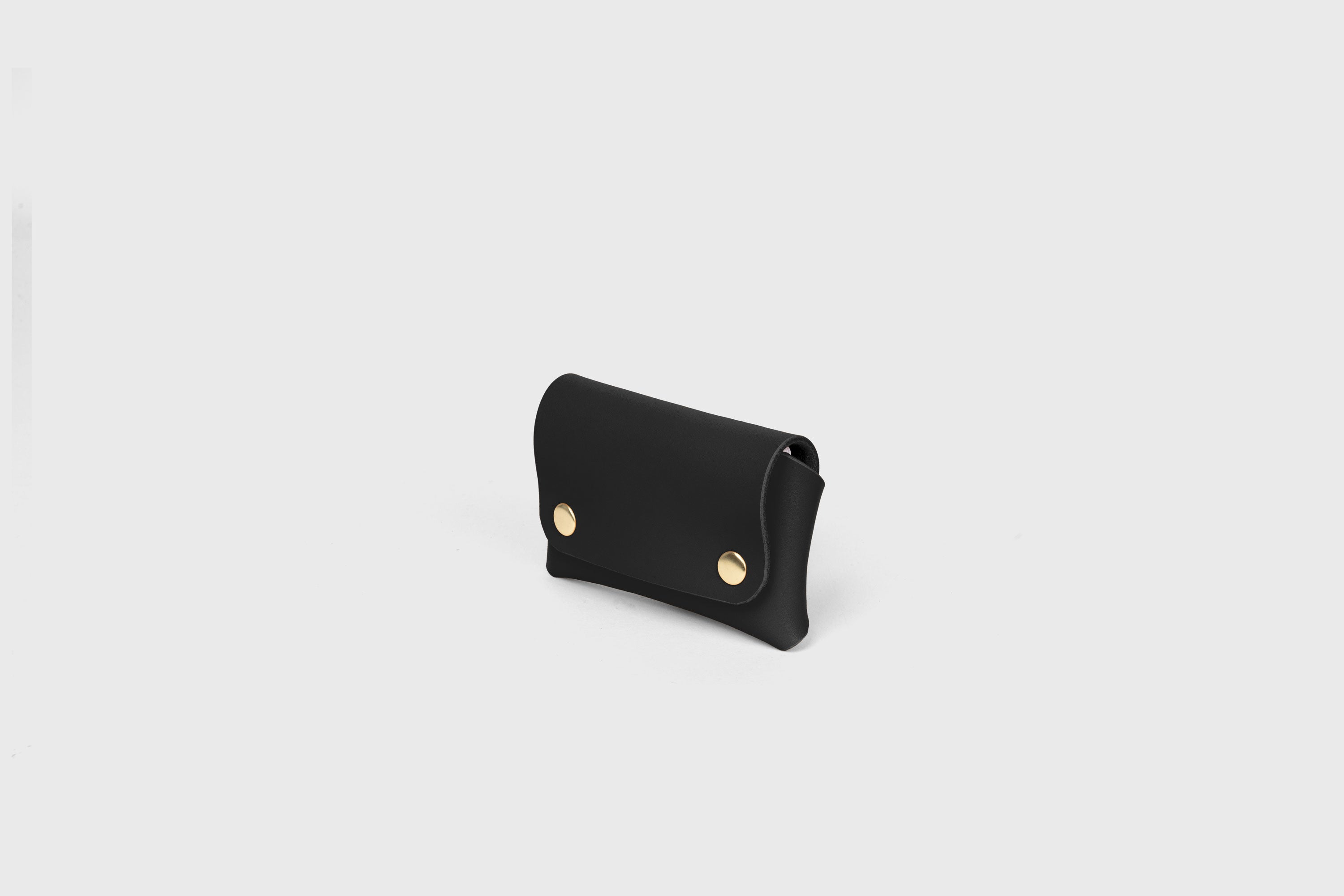 Card Holder With Snap Buttons In Black Color Leather Minimalistic Design Leather Atelier Madre Manuel Dreesmann