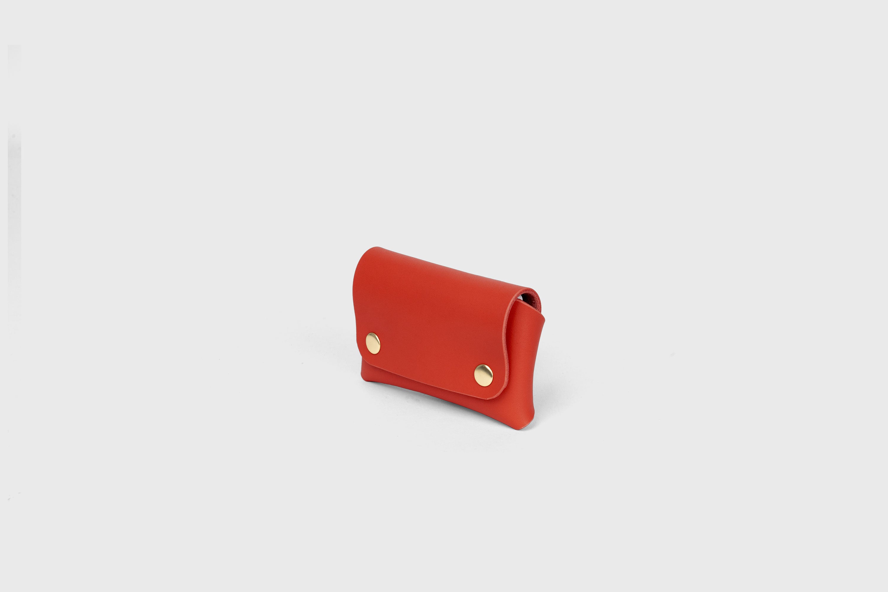 Card Holder With Snap Buttons In Red Leather Minimalistic Design Leather Atelier Madre Manuel Dreesmann