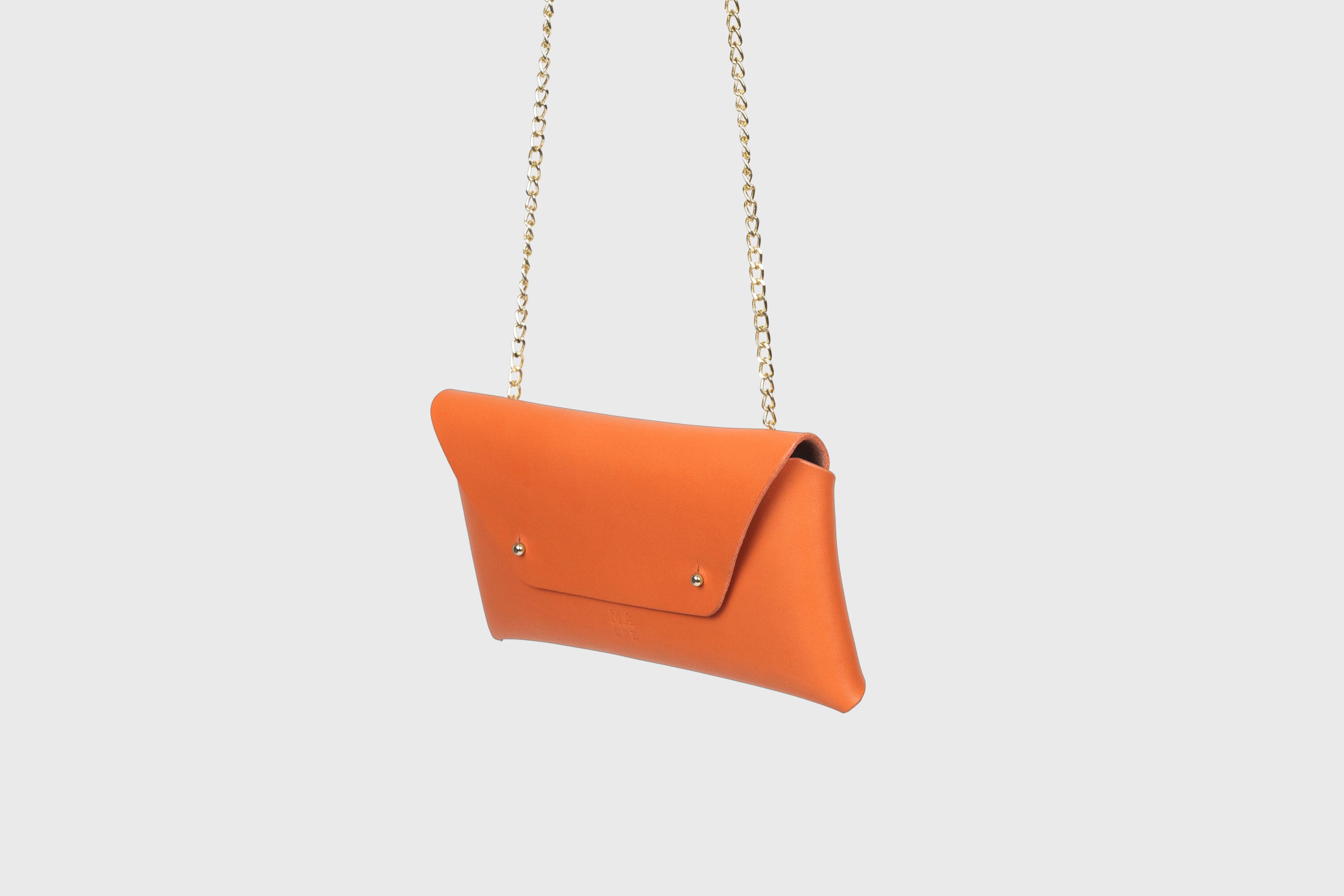 Clutch Leather Bag Gold Chain Orange Color Shoulder Crossbody Bag Premium Quality Minimalist Design Atelier Madre Manuel Dreesmann Barcelona
