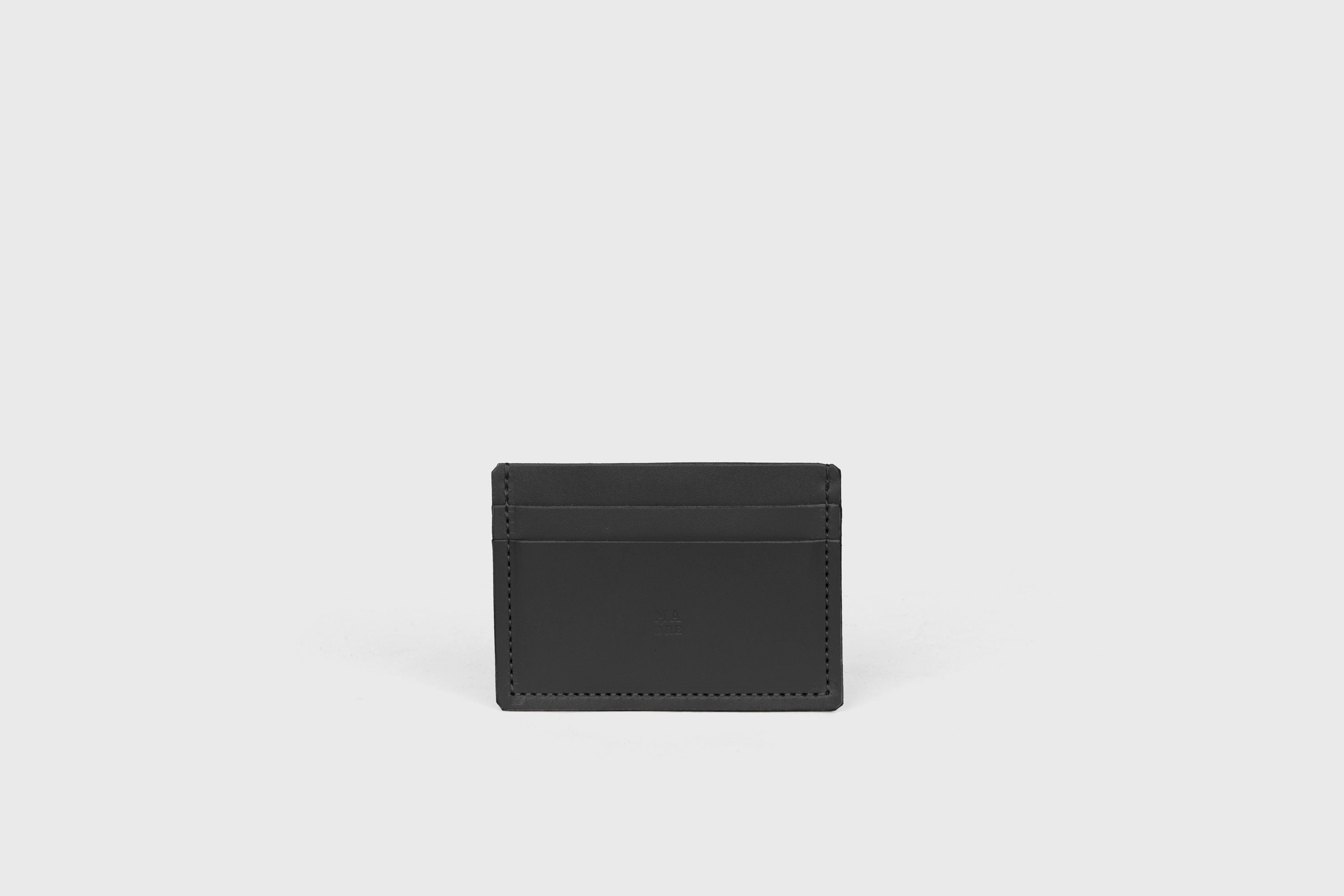 Credit Card Wallet Minimalist In Black Color Leather Vegetable Tanned Leather Handmade and Design by Atelier Madre Manuel Dreesmann Barcelona Spain