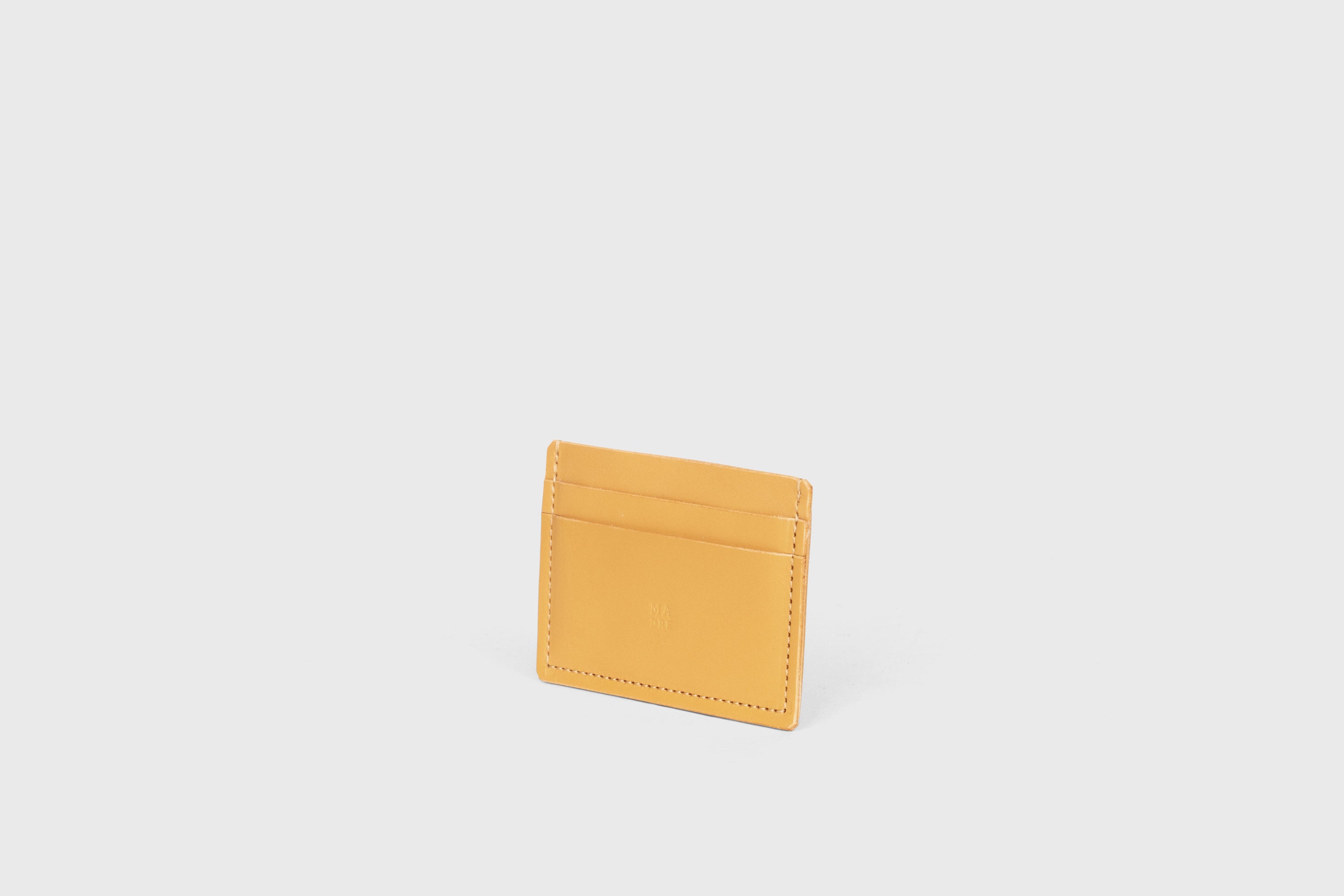Credit Card Wallet Minimalist In Brown Color Leather Vegetable Tanned Leather Handmade and Design by Atelier Madre Manuel Dreesmann Barcelona Spain