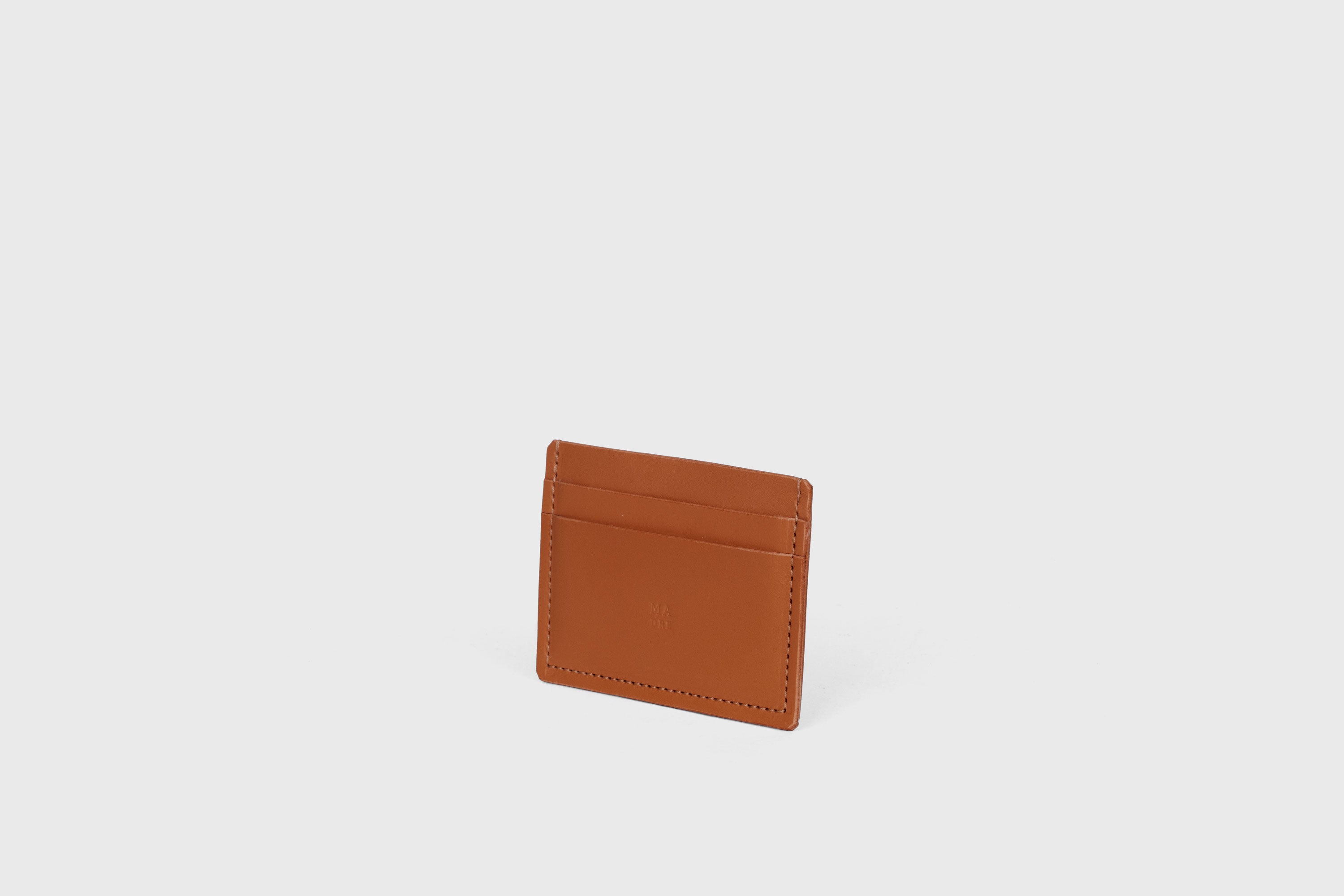 Credit Card Wallet Minimalist In Dark BrownColor Leather Vegetable Tanned Leather Handmade and Design by Atelier Madre Manuel Dreesmann Barcelona Spain