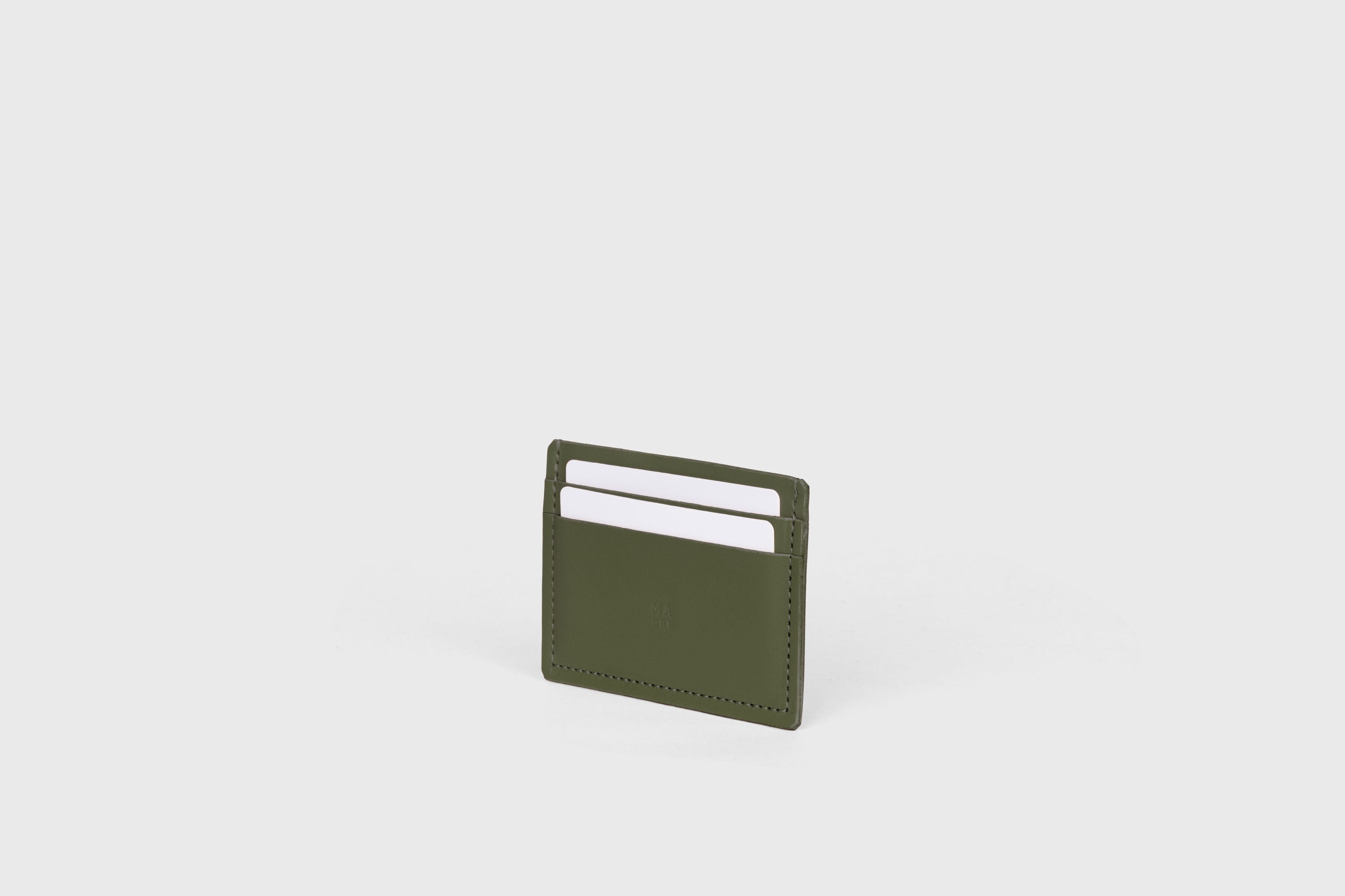 Credit Card Wallet Minimalist In Olive Green Color Leather Vegetable Tanned Leather Handmade and Design by Atelier Madre Manuel Dreesmann Barcelona Spain