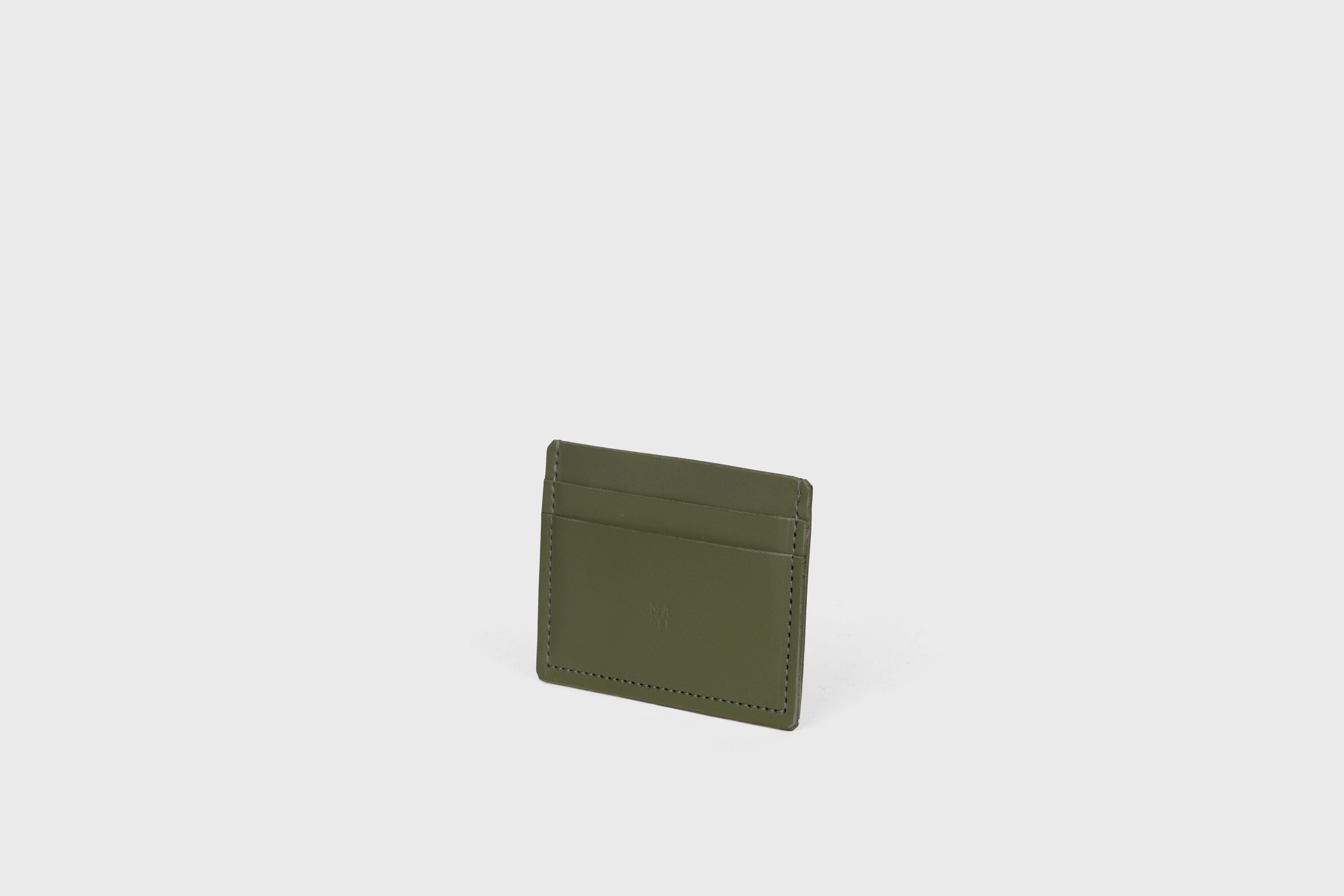 Credit Card Wallet Minimalist In Olive Green Color Leather Vegetable Tanned Leather Handmade and Design by Atelier Madre Manuel Dreesmann Barcelona Spain