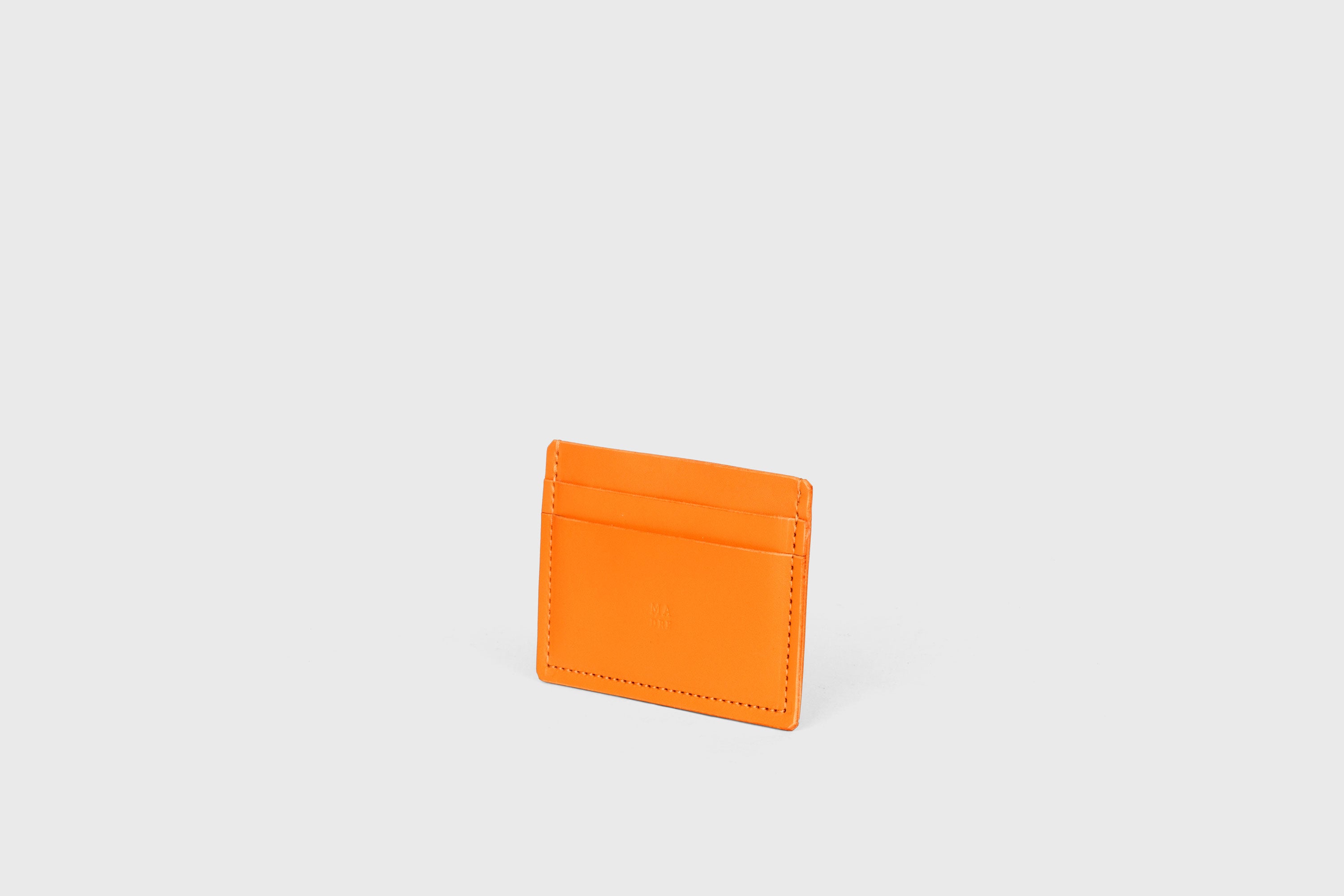 Credit Card Wallet Minimalist In Orange Color Leather Vegetable Tanned Leather Handmade and Design by Atelier Madre Manuel Dreesmann Barcelona Spain