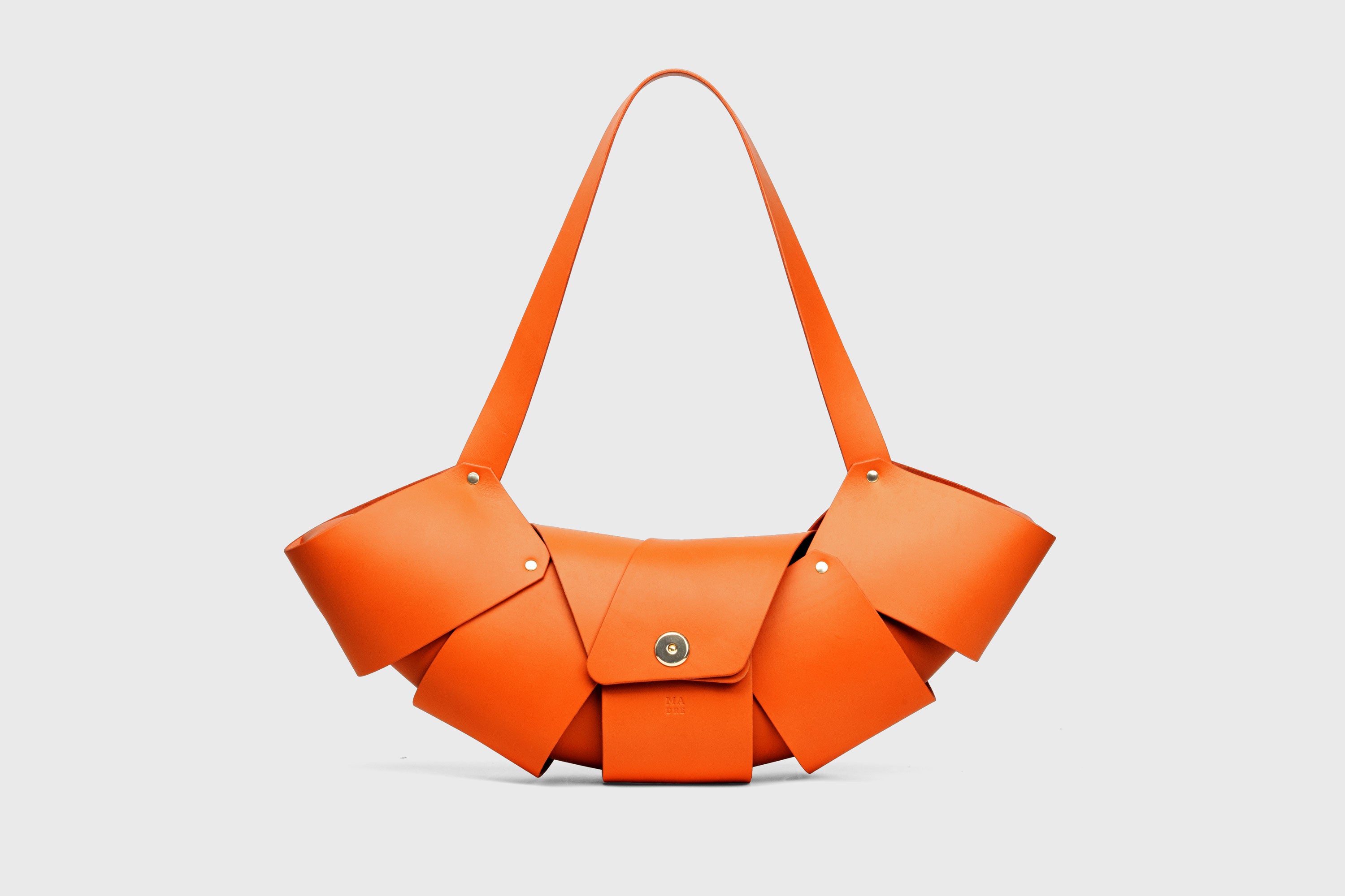 Croissant Bag Big Orange Leather Magnetic Closure Full Grain Vegetable Tanned Leather High Quality Modern Minimalistic Organic Design Full Brass Rivets Atelier Madre Manuel Dreesmann Barcelona Spain