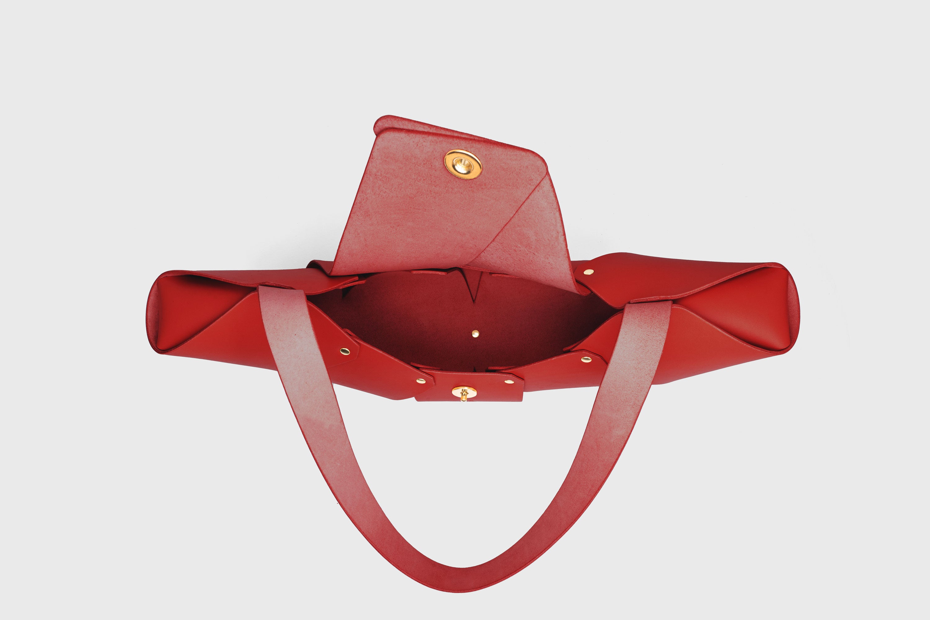 Croissant Bag Big Red Leather Magnetic Closure Full Grain Vegetable Tanned Leather High Quality Modern Minimalistic Organic Design Full Brass Rivets Atelier Madre Manuel Dreesmann Barcelona Spain