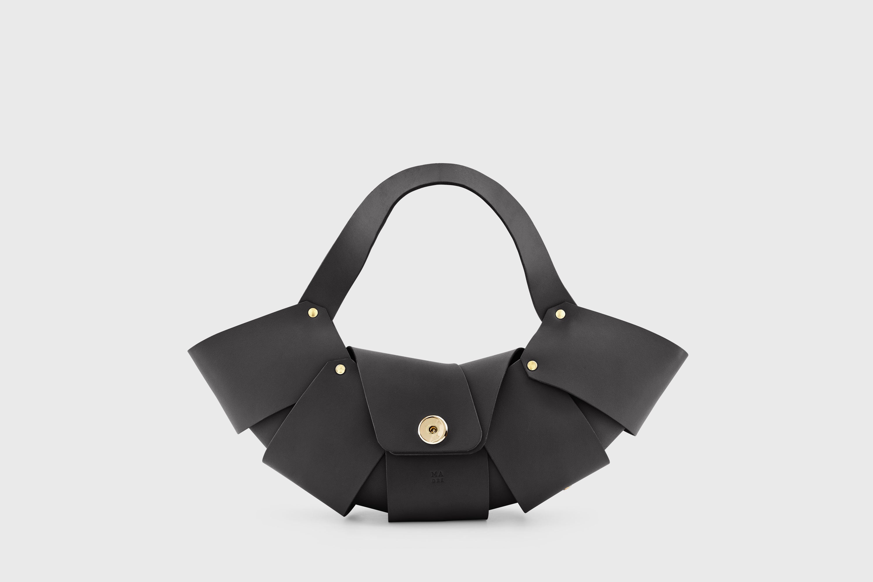 Croissant Bag Black Color Leather Magnetic Closure Full Grain Vegetable Tanned Leather High Quality Modern Minimalistic Organic Design Full Brass Rivets Atelier Madre Manuel Dreesmann Barcelona Spain