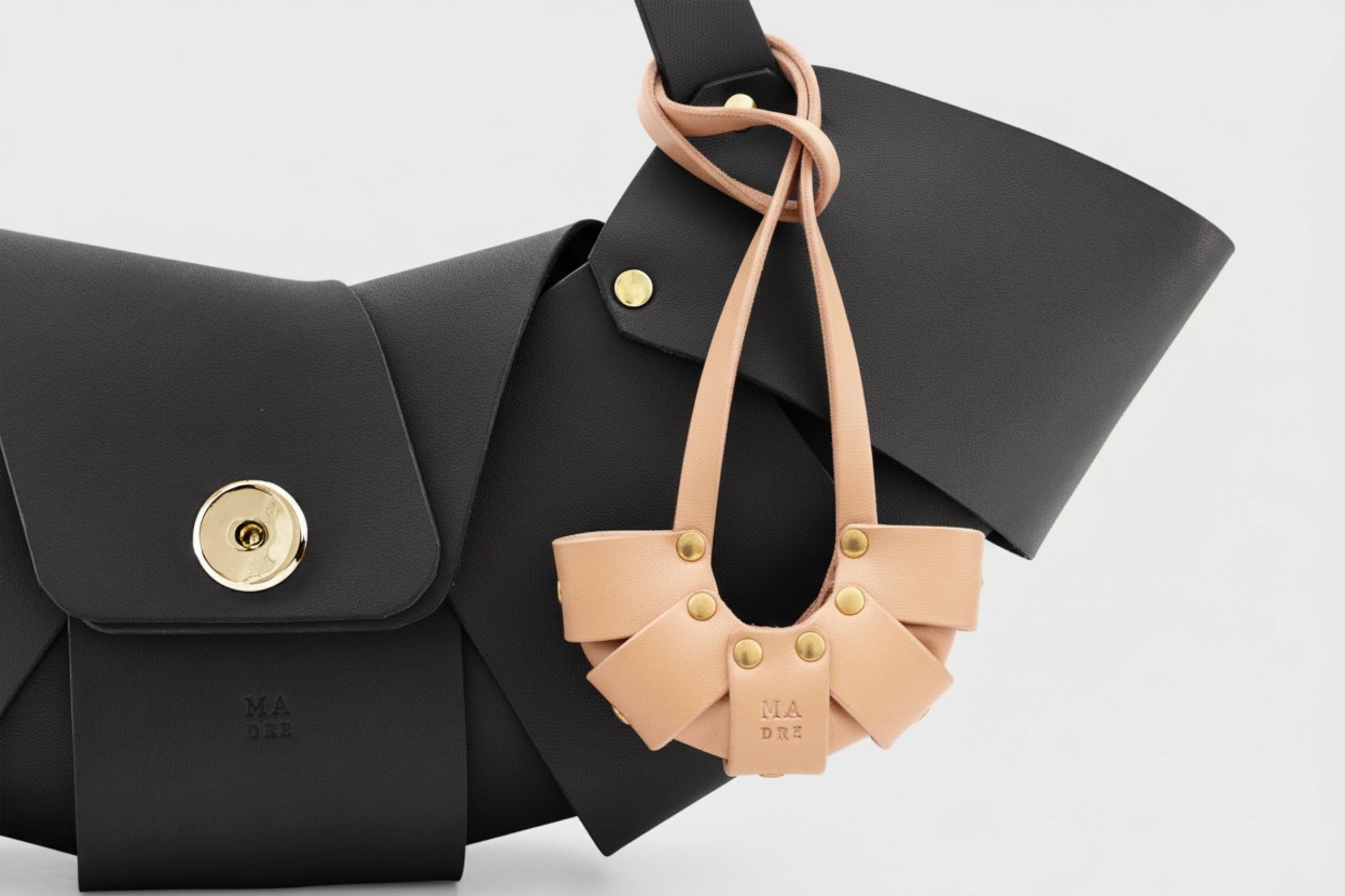 Natural Color Leather Croissant Bag Charm Minimal Premium Design On Black Croissant Bag Tied Atelier Madre Manuel Dreesmann Barcelona Spain