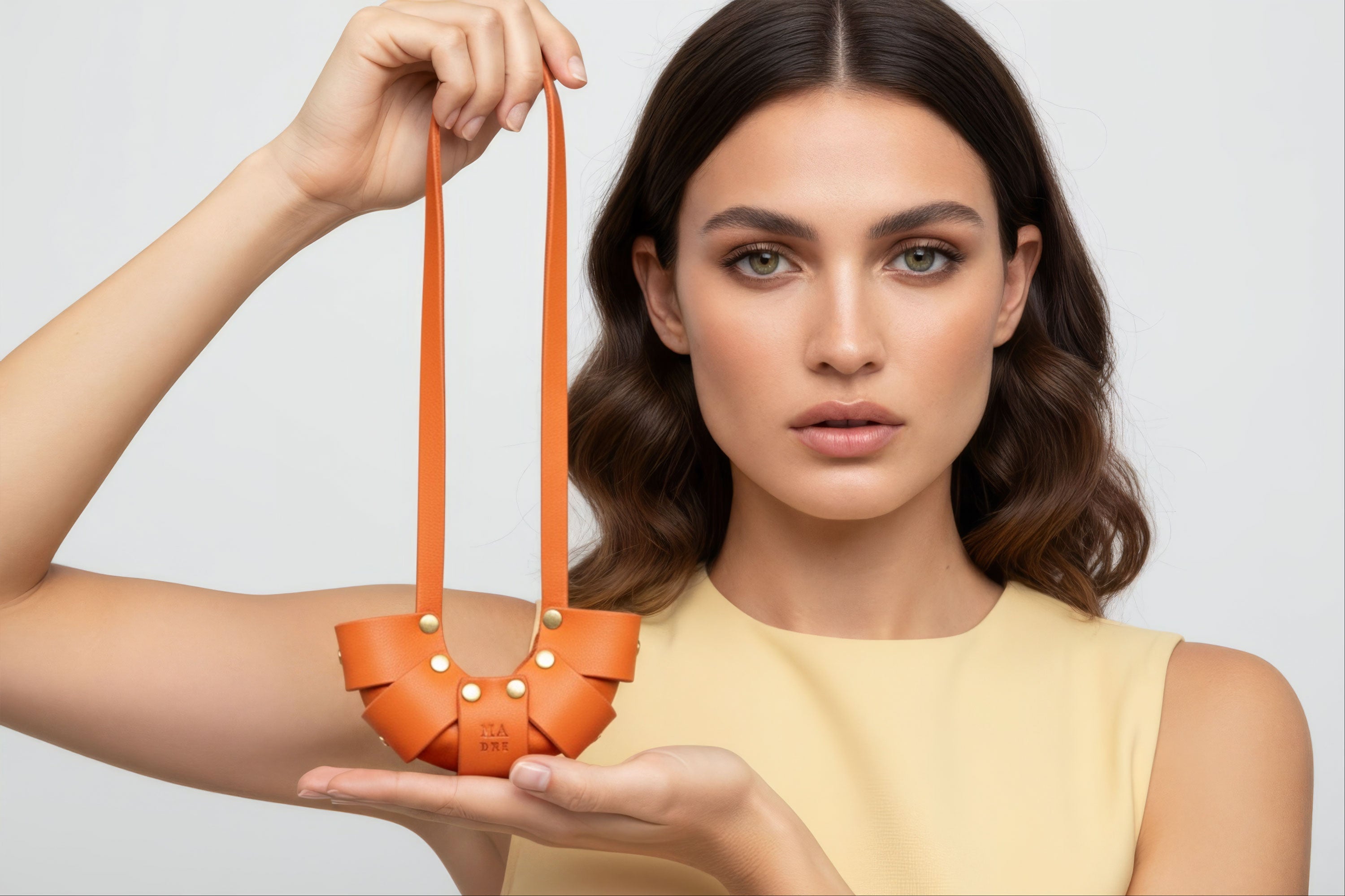 Orange Color Leather Croissant Bag Charm Minimal Premium Design On Model Atelier Madre Manuel Dreesmann Barcelona Spain