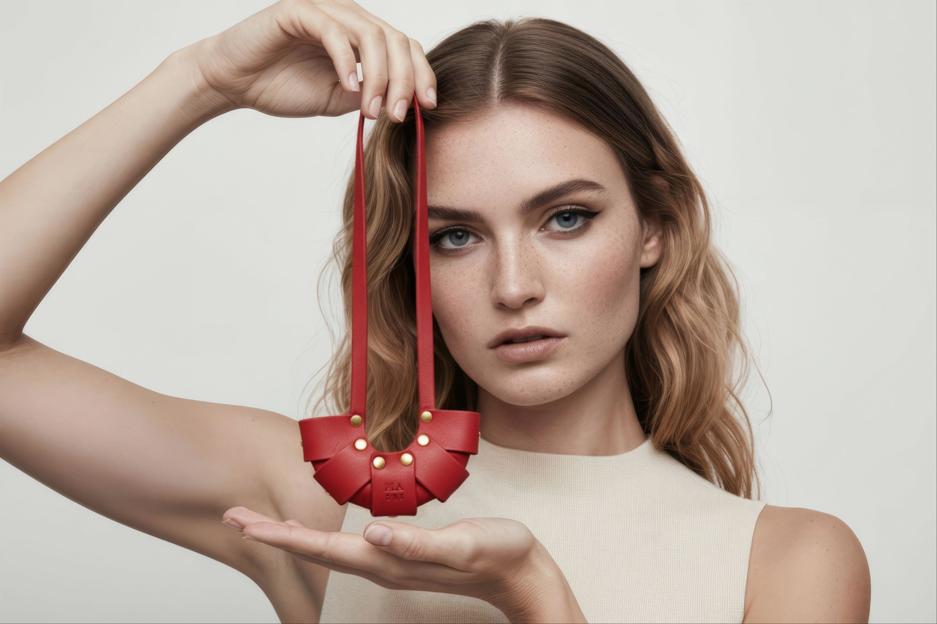 Red Color Leather Croissant Bag Charm Minimal Premium Design On Model Atelier Madre Manuel Dreesmann Barcelona Spain
