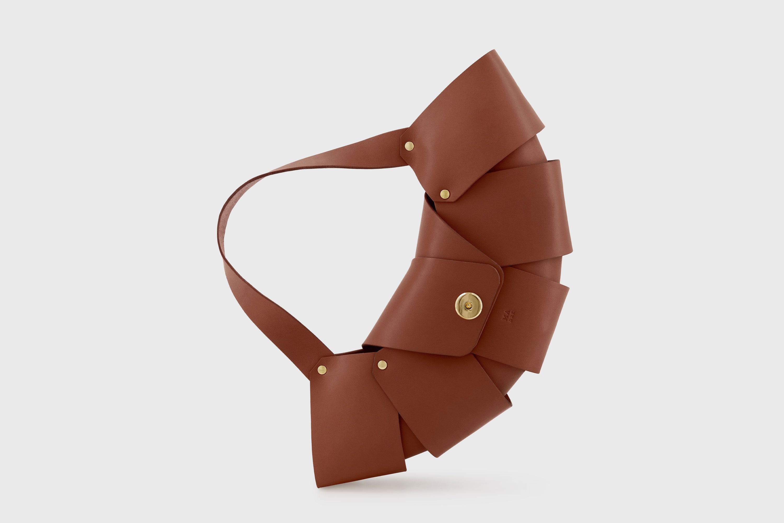 Croissant Bag Dark Brown Color Leather Magnetic Closure Full Grain Vegetable Tanned Leather High Quality Modern Minimalistic Organic Design Full Brass Rivets Atelier Madre Manuel Dreesmann Barcelona Spain
