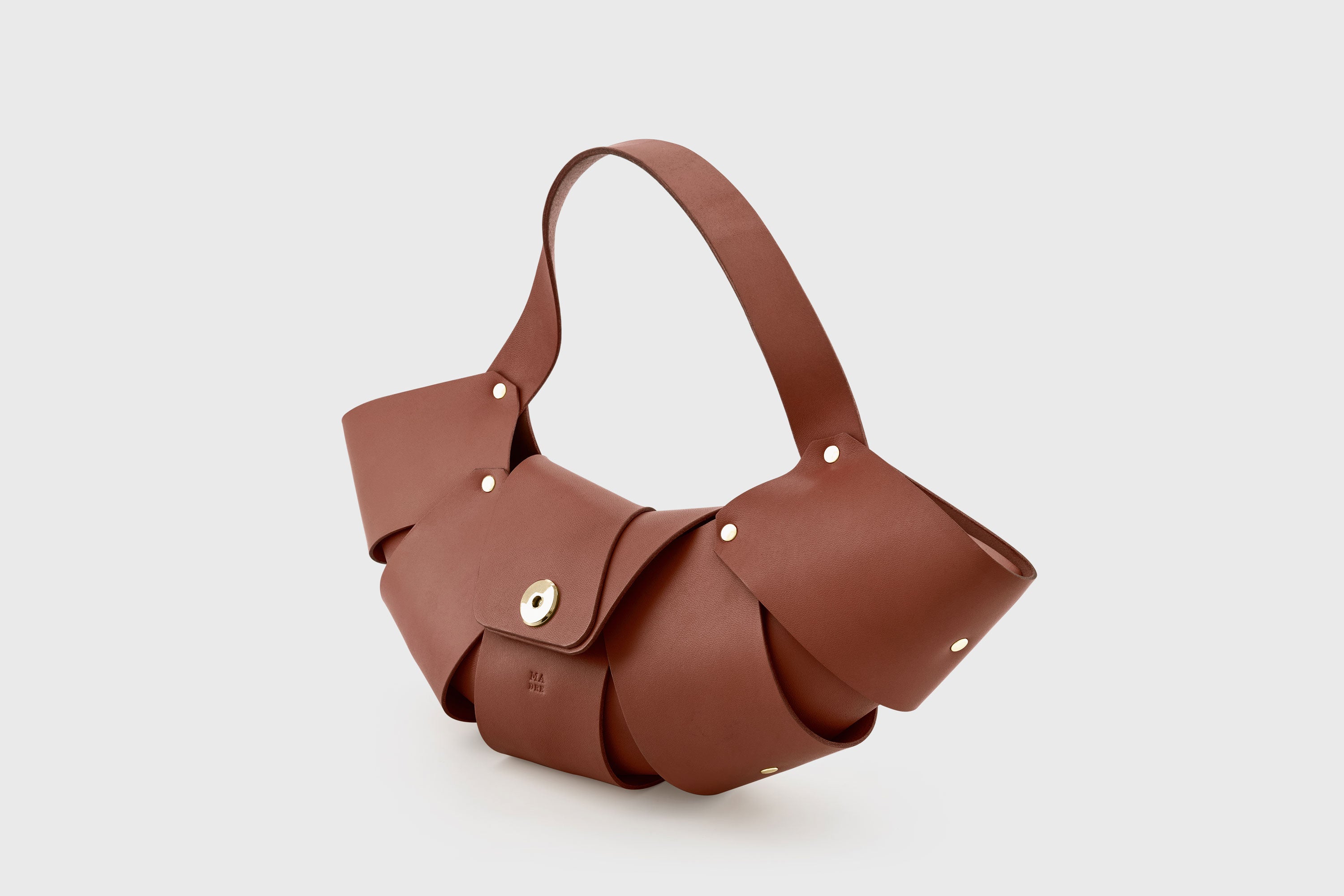 Croissant Bag Dark Brown Color Leather Magnetic Closure Full Grain Vegetable Tanned Leather High Quality Modern Minimalistic Organic Design Full Brass Rivets Atelier Madre Manuel Dreesmann Barcelona Spain