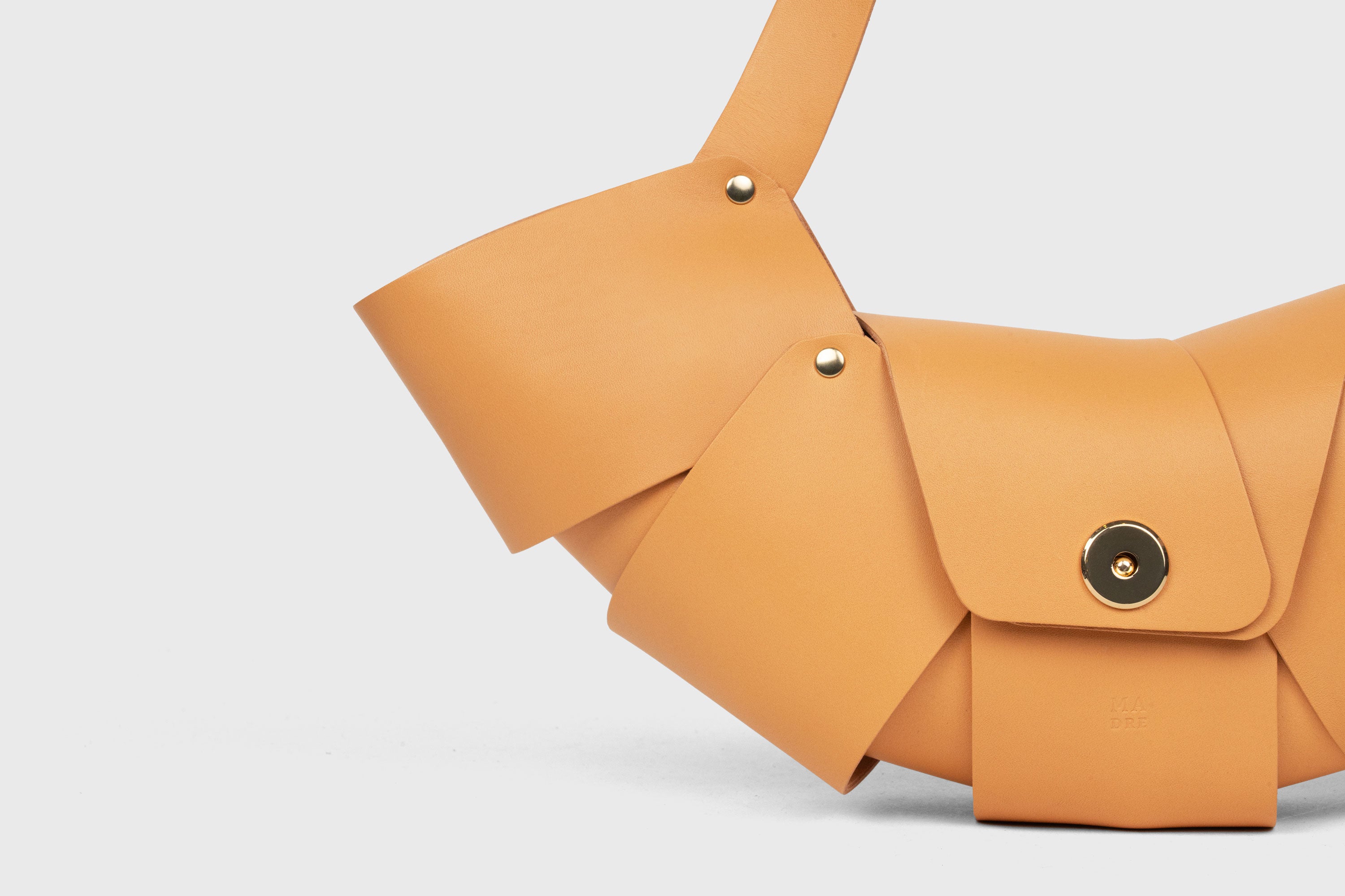 Croissant Bag Brown Color Leather Magnetic Closure Full Grain Vegetable Tanned Leather High Quality Modern Minimalistic Organic Design Full Brass Rivets Atelier Madre Manuel Dreesmann Barcelona Spain
