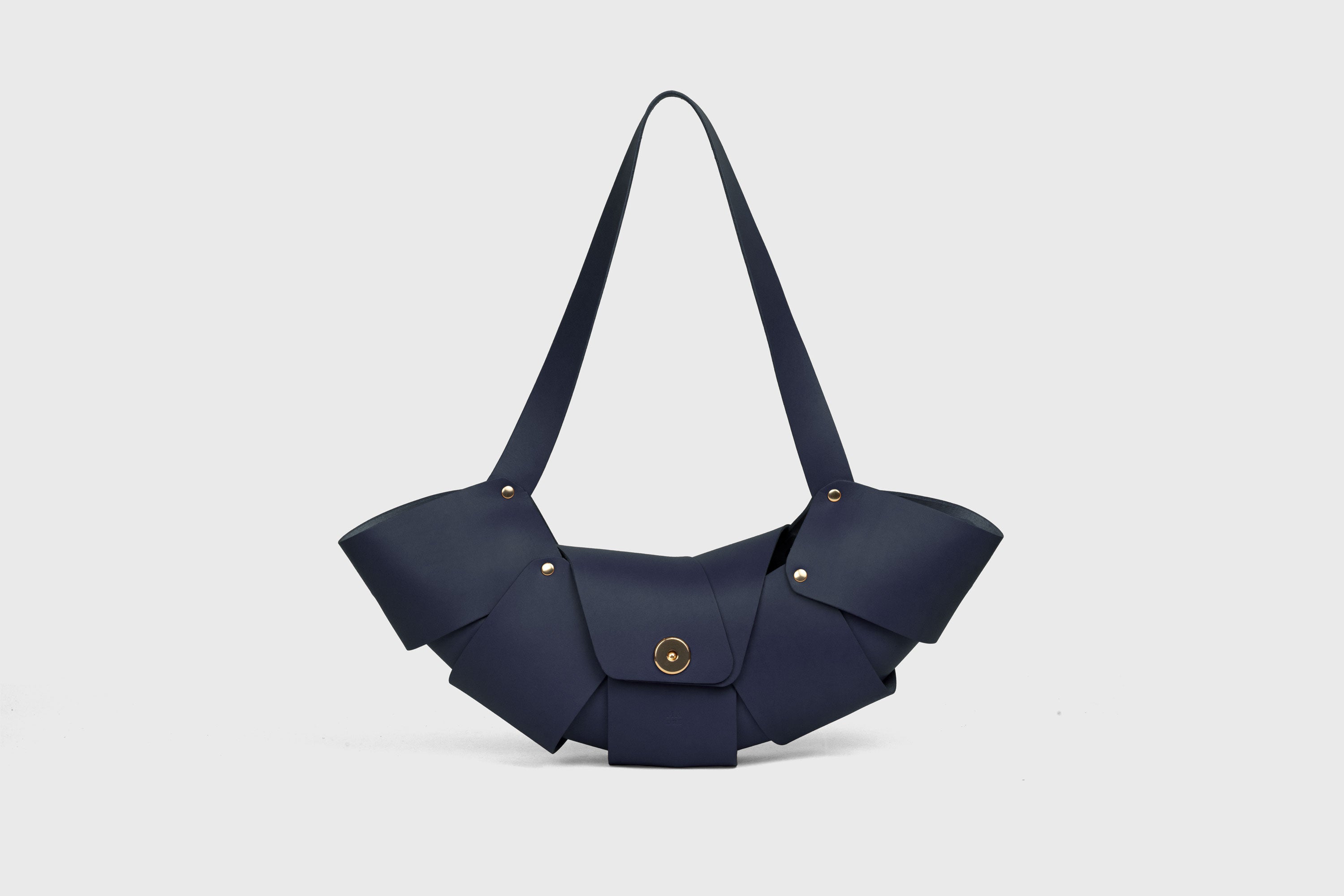 Croissant Bag Marine Blue Leather Magnetic Closure Full Grain Vegetable Tanned Leather High Quality Modern Minimalistic Organic Design Full Brass Rivets Atelier Madre Manuel Dreesmann Barcelona Spain