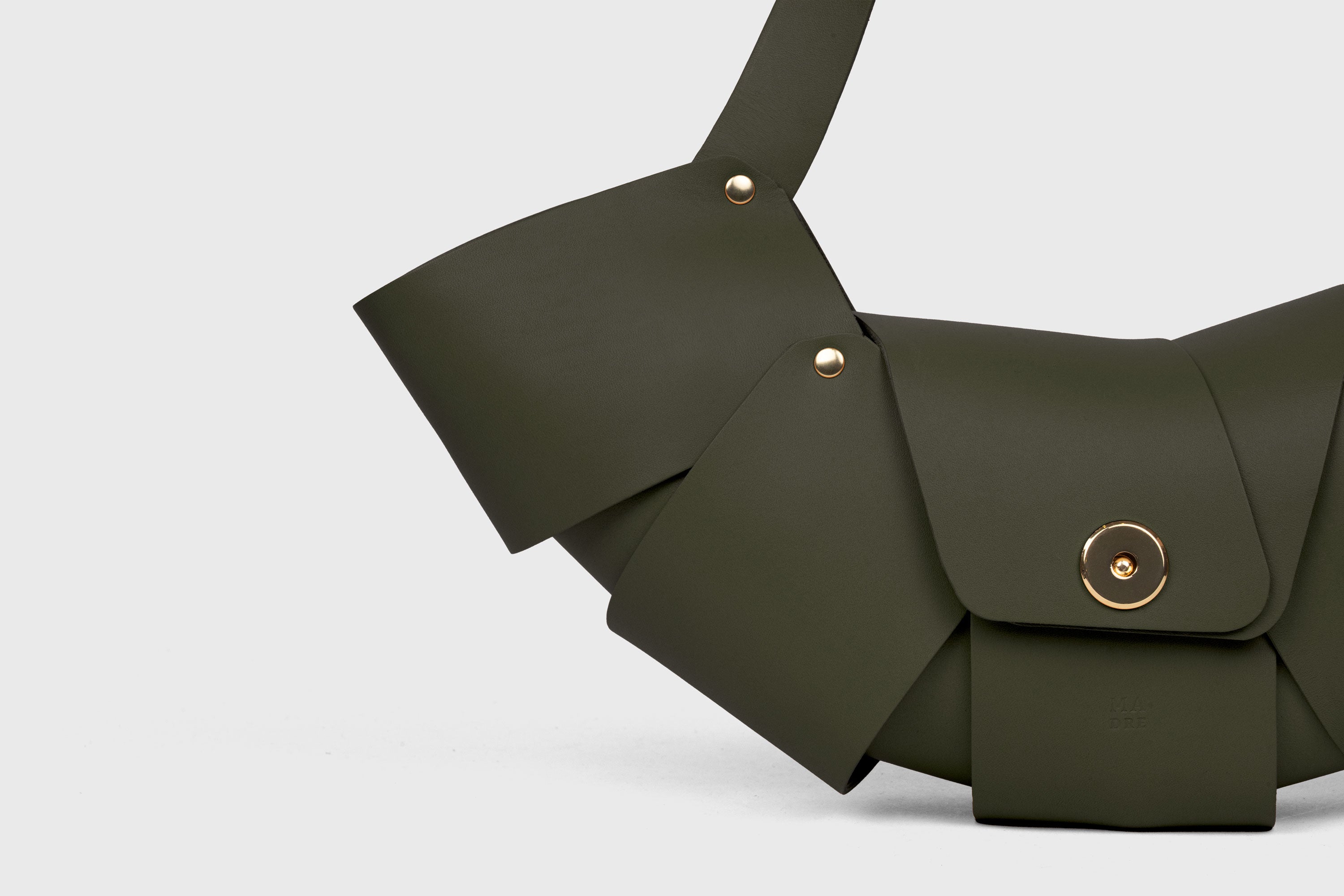 Croissant Bag Olive Green Color Leather Magnetic Closure Full Grain Vegetable Tanned Leather High Quality Modern Minimalistic Organic Design Full Brass Rivets Atelier Madre Manuel Dreesmann Barcelona Spain