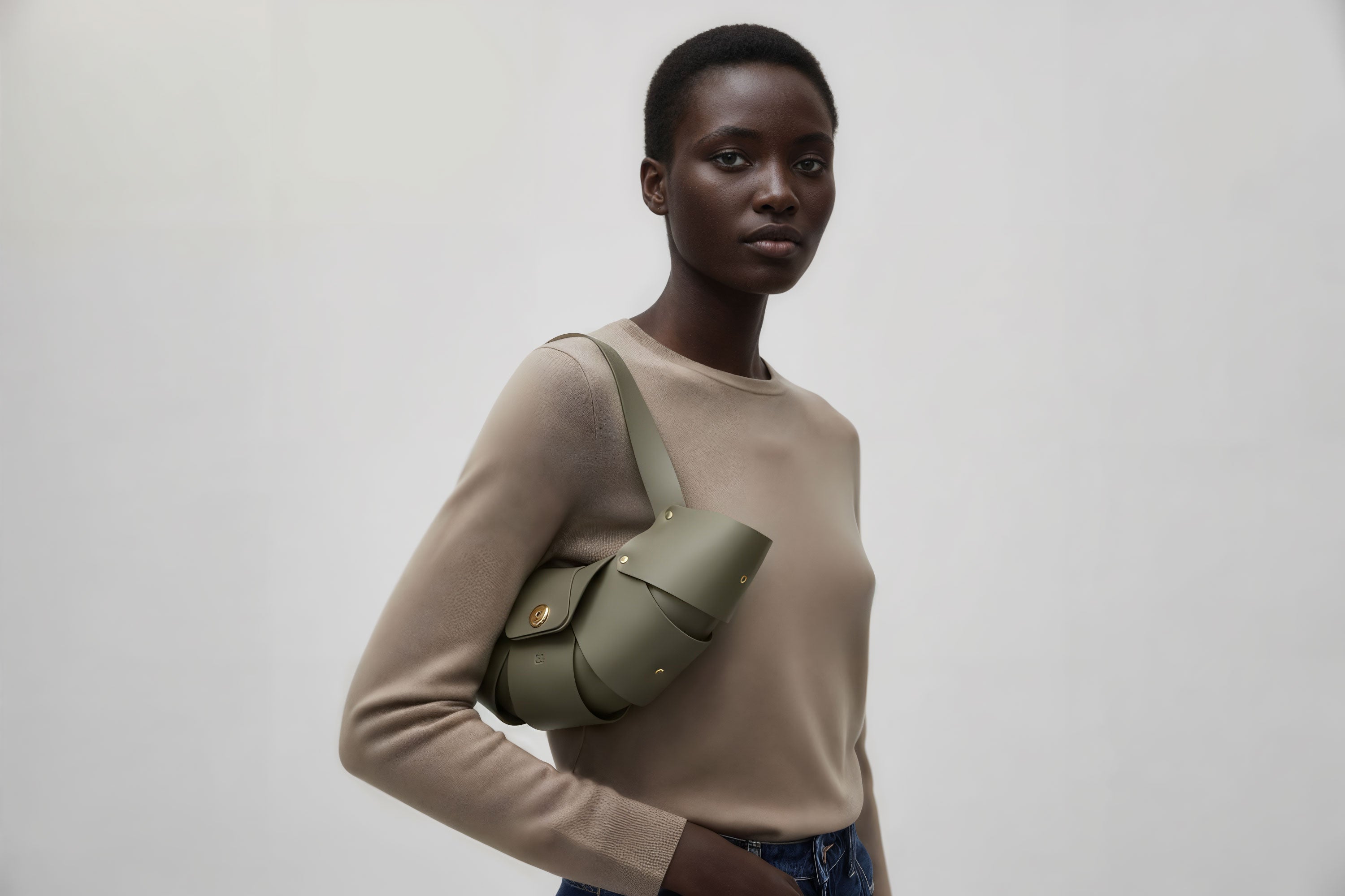 Croissant Bag Olive Green Color Leather Minimalistic Design On Model White Background Atelier Madre Manuel Dreesmann Barcelona