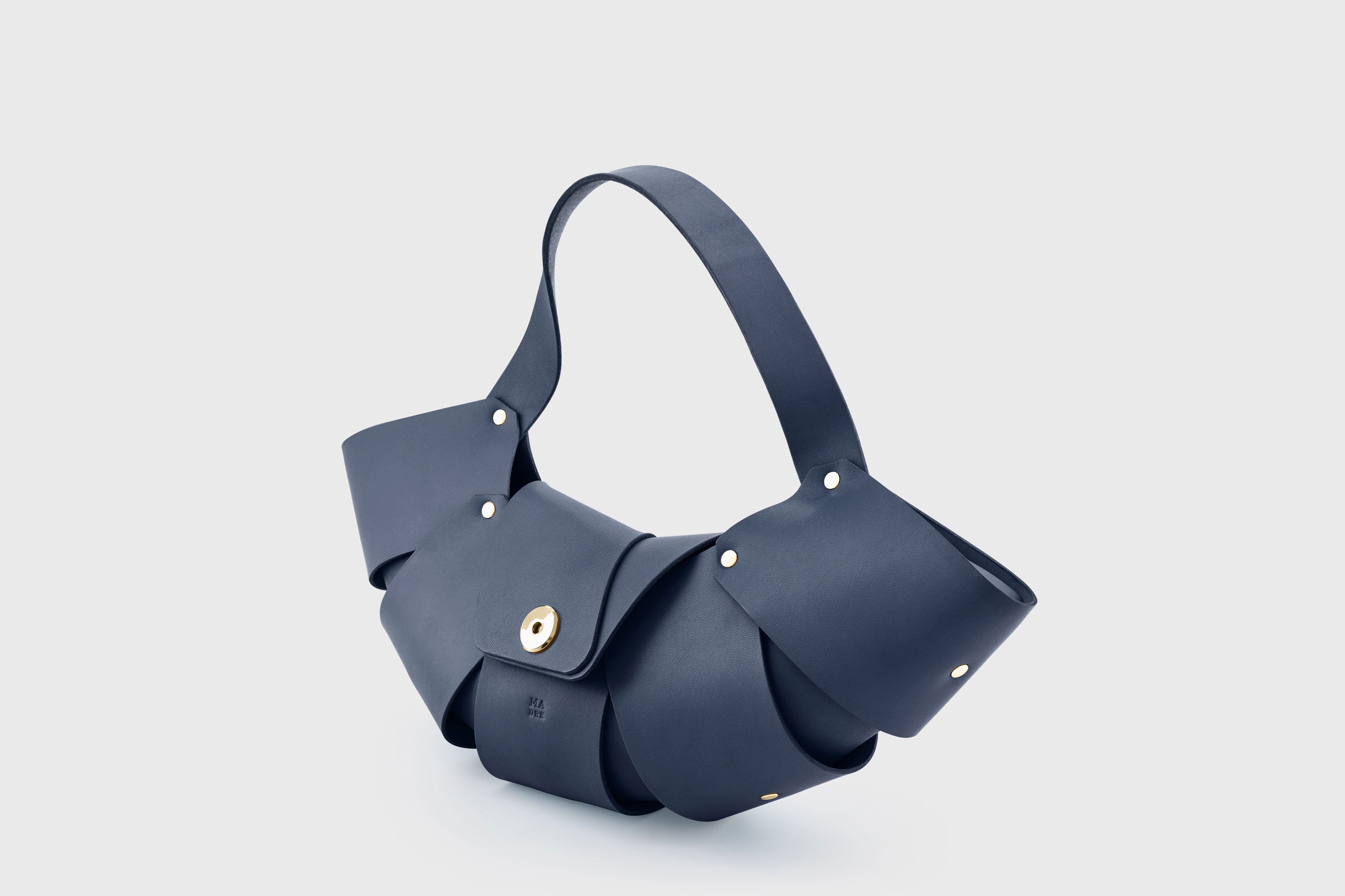Croissant Bag Marine Blue Color Leather Magnetic Closure Full Grain Vegetable Tanned Leather High Quality Modern Minimalistic Organic Design Full Brass Rivets Atelier Madre Manuel Dreesmann Barcelona Spain