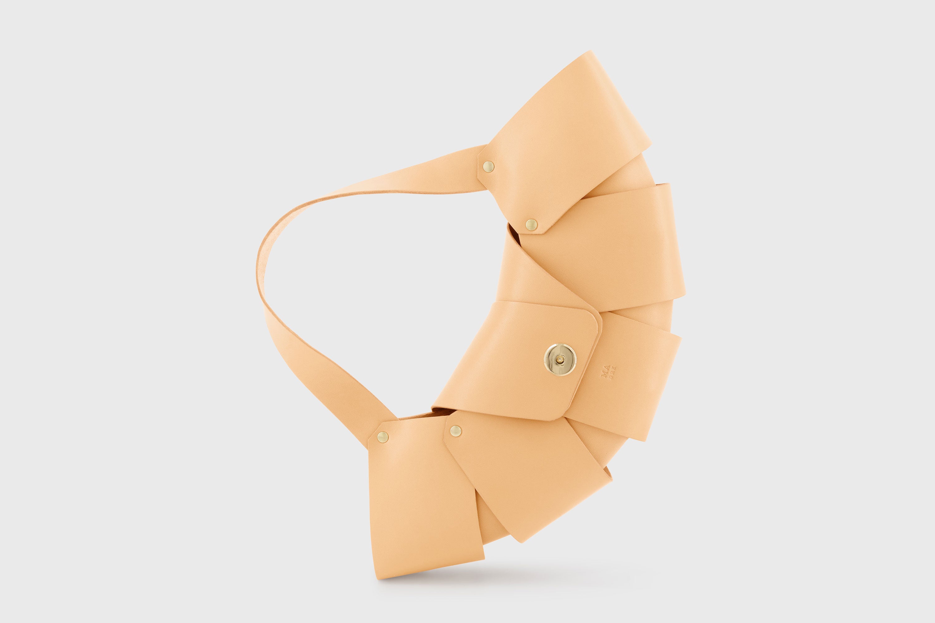 Croissant Bag Natural Leather Magnetic Closure Full Grain Vegetable Tanned Leather High Quality Modern Minimalistic Organic Design Full Brass Rivets Atelier Madre Manuel Dreesmann Barcelona Spain