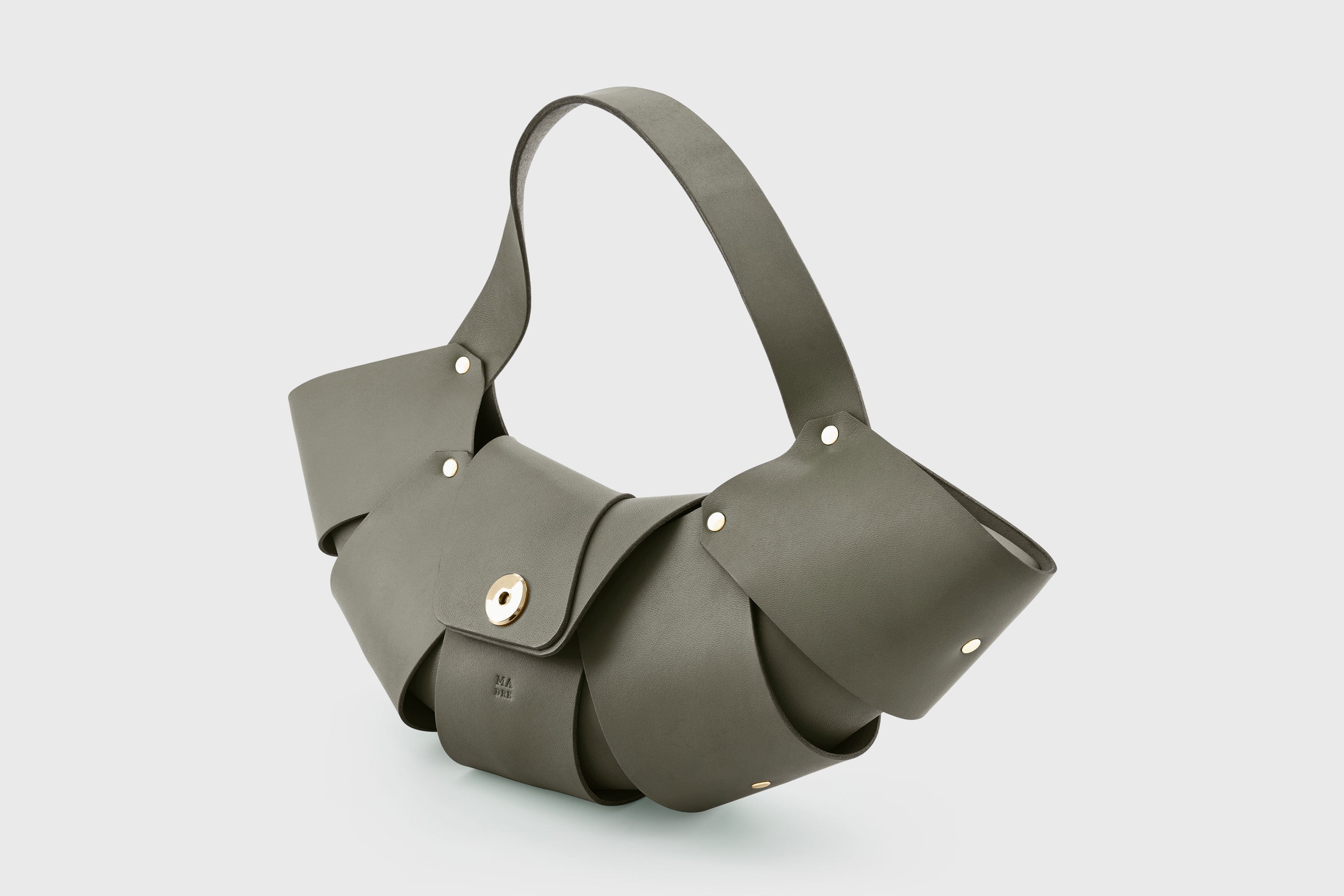 Croissant Bag Olive Green Color Leather Magnetic Closure Full Grain Vegetable Tanned Leather High Quality Modern Minimalistic Organic Design Full Brass Rivets Atelier Madre Manuel Dreesmann Barcelona Spain