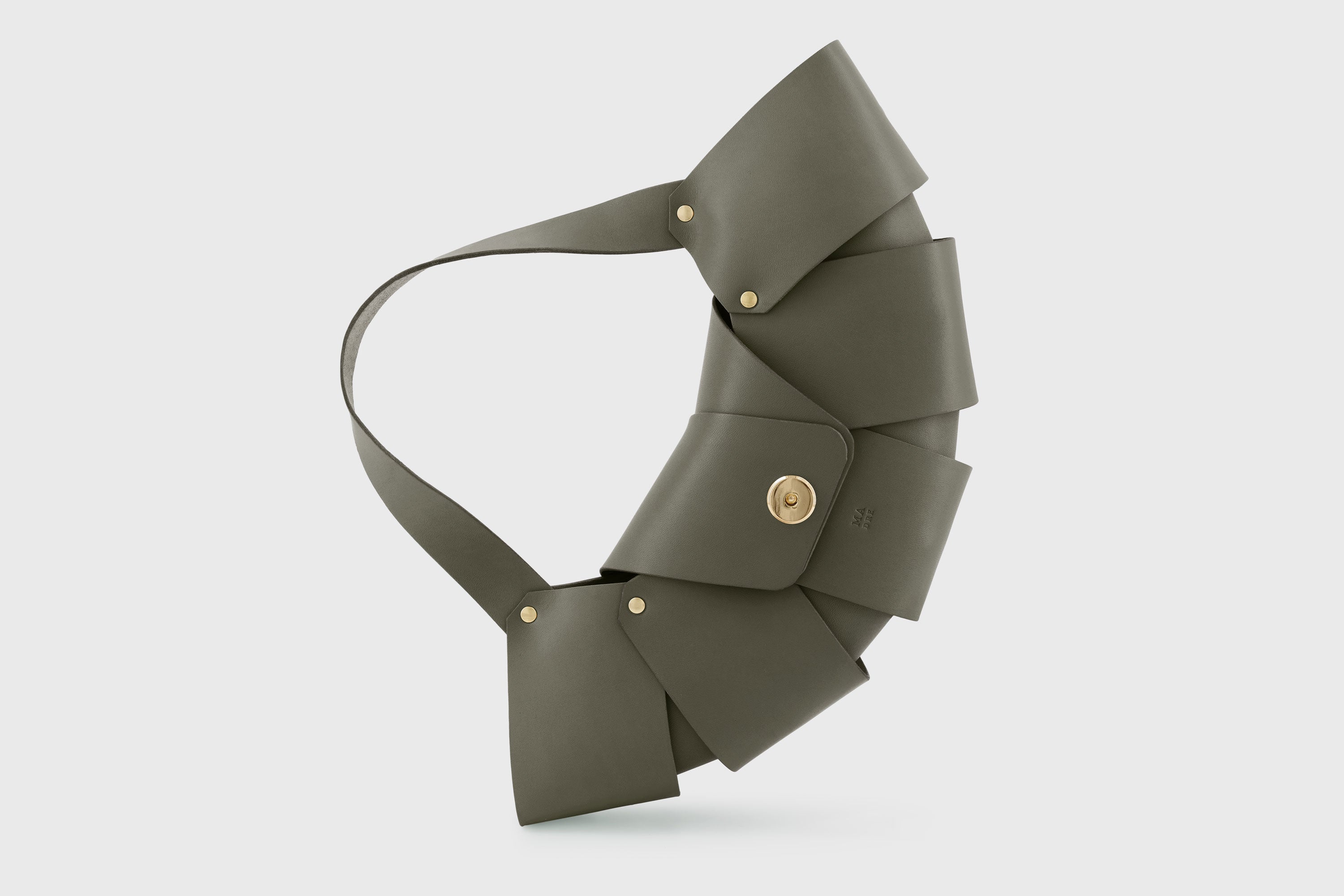 Croissant Bag Olive Green Color Leather Magnetic Closure Full Grain Vegetable Tanned Leather High Quality Modern Minimalistic Organic Design Full Brass Rivets Atelier Madre Manuel Dreesmann Barcelona Spain