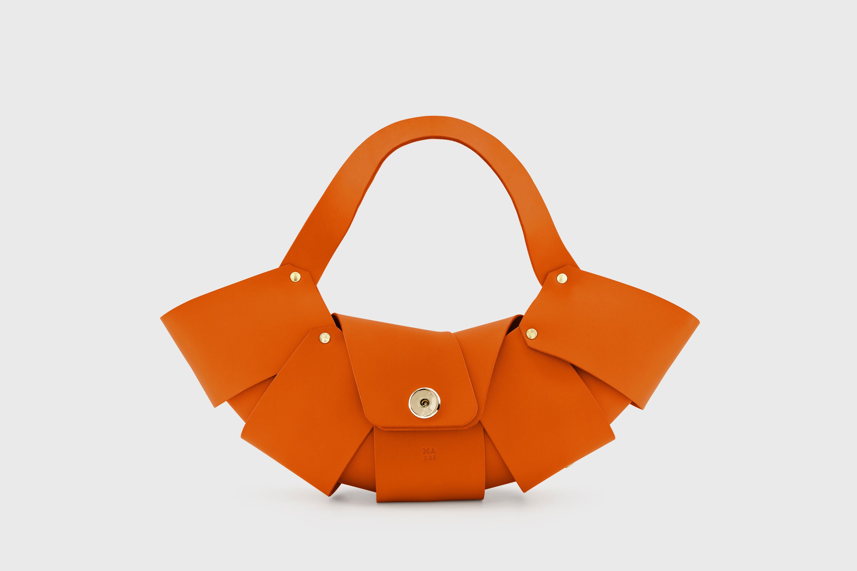 Croissant Bag Orange Color Leather Magnetic Closure Full Grain Vegetable Tanned Leather High Quality Modern Minimalistic Organic Design Full Brass Rivets Atelier Madre Manuel Dreesmann Barcelona Spain