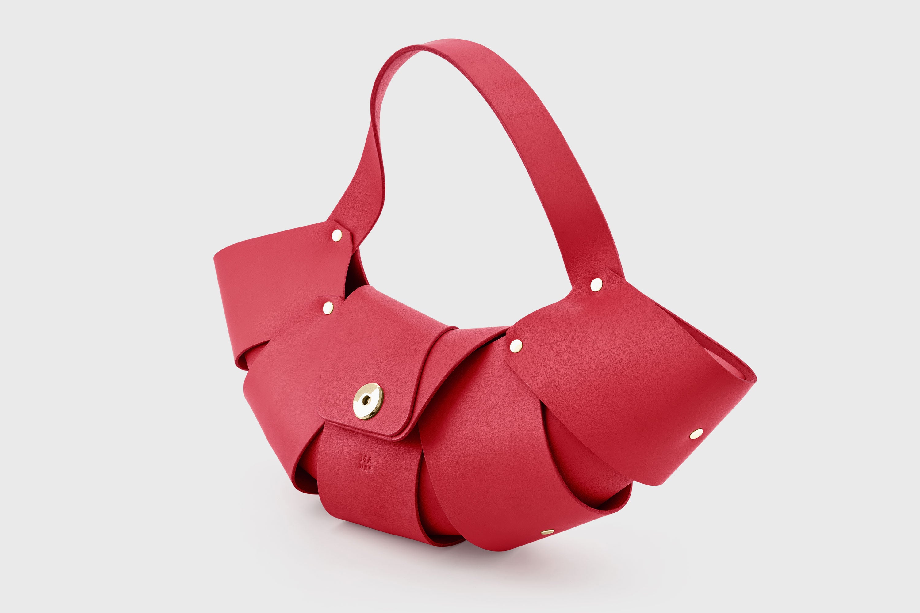 Croissant Bag Red Color Leather Magnetic Closure Full Grain Vegetable Tanned Leather High Quality Modern Minimalistic Organic Design Full Brass Rivets Atelier Madre Manuel Dreesmann Barcelona Spain