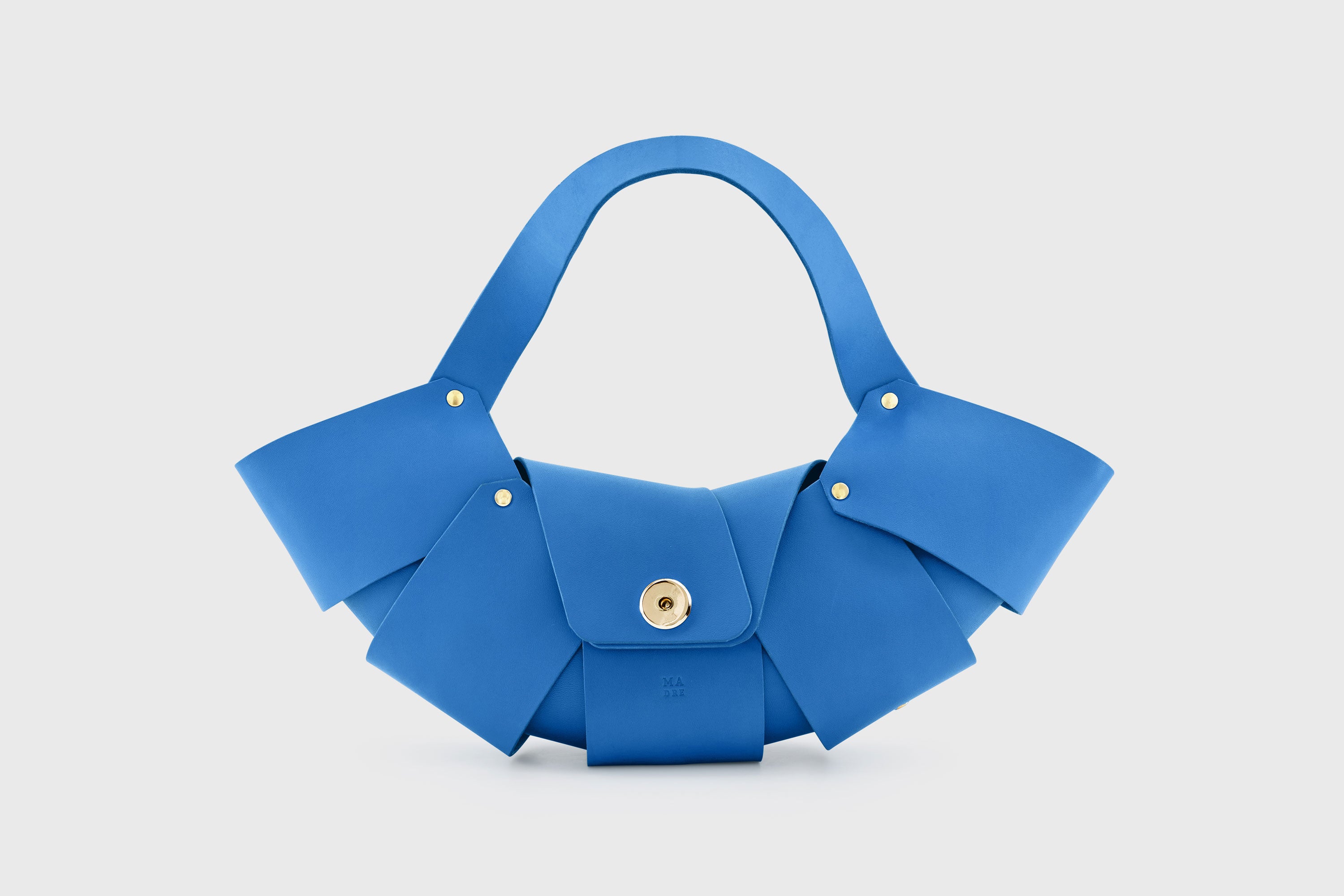 Croissant Bag Royal Blue Color Leather Magnetic Closure Full Grain Vegetable Tanned Leather High Quality Modern Minimalistic Organic Design Full Brass Rivets Atelier Madre Manuel Dreesmann Barcelona Spain