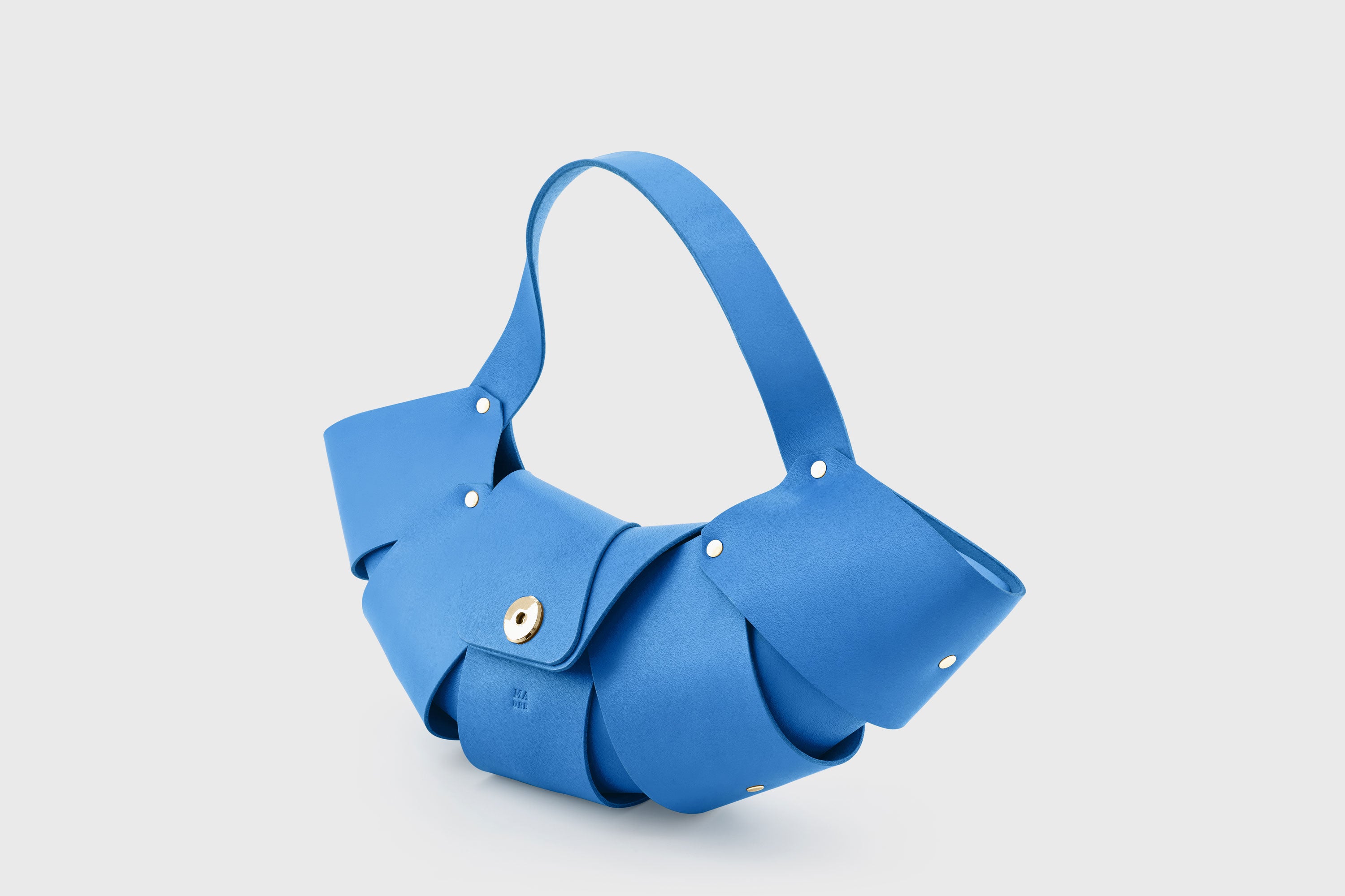 Croissant Bag Royal Blue Color Leather Magnetic Closure Full Grain Vegetable Tanned Leather High Quality Modern Minimalistic Organic Design Full Brass Rivets Atelier Madre Manuel Dreesmann Barcelona Spain