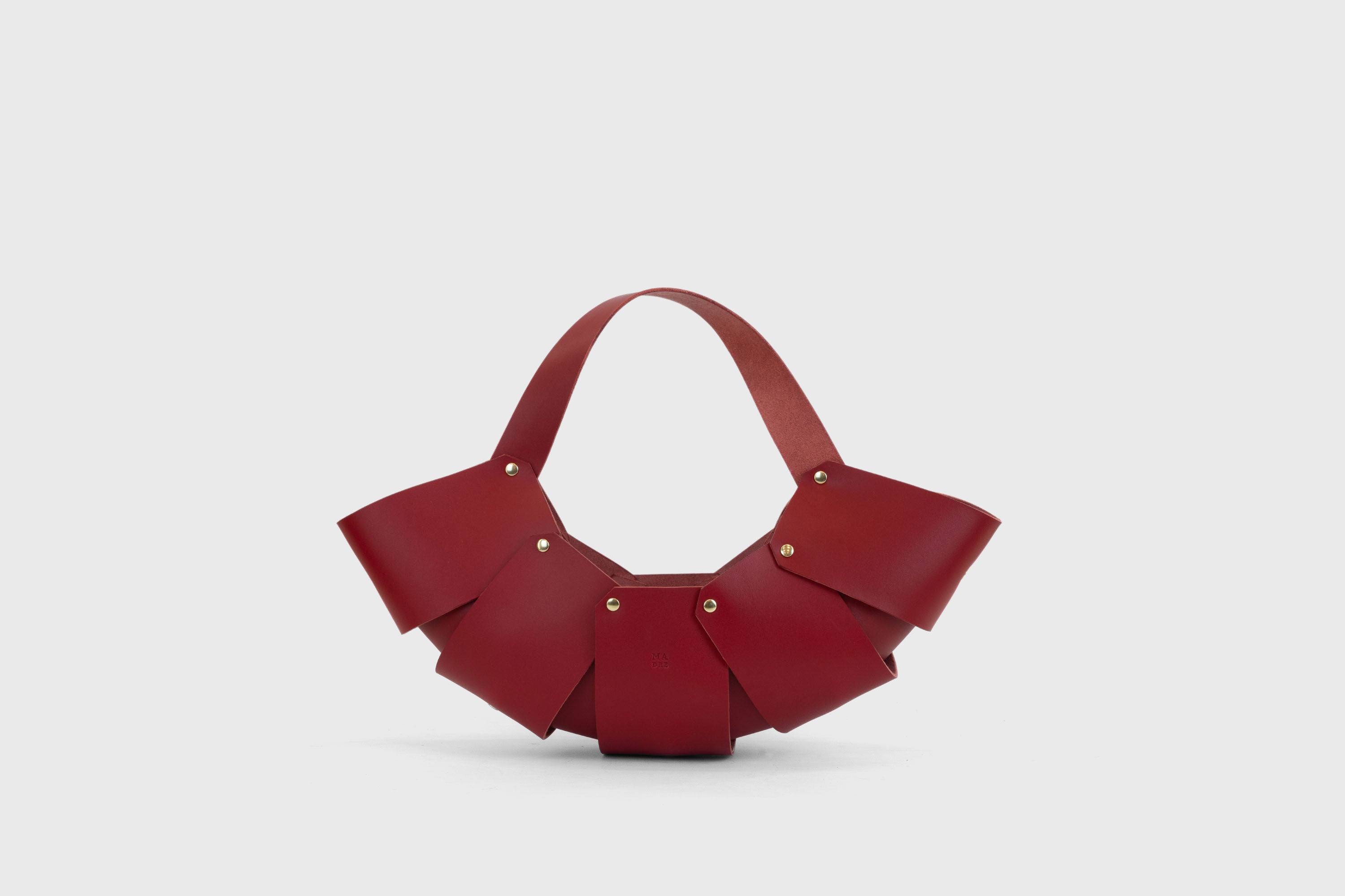 Croissant Leather Bag Red Vegetable Tanned Full Grain Premium Spain Brass Rivets Design Minimalist Modern Shopper Handbag Pouch Handbag Atelier Madre Manuel Dreesmann Barcelona